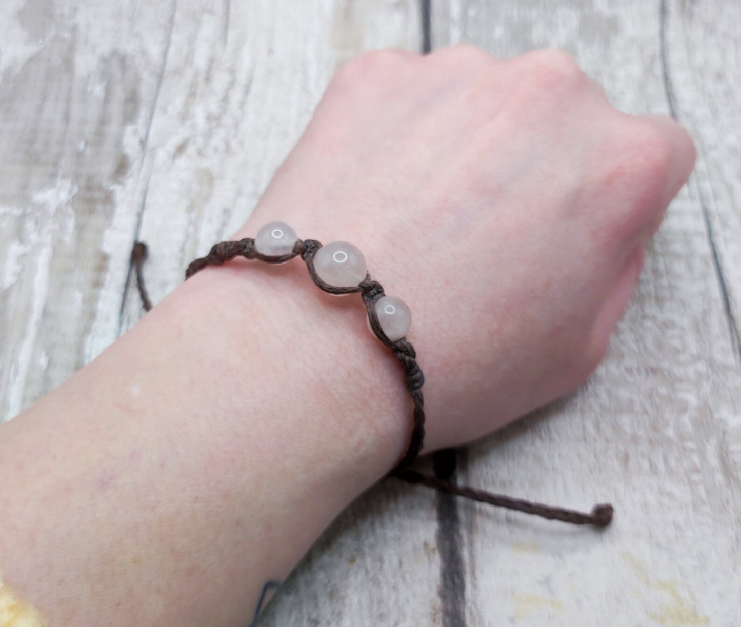 Rose quartz beaded macramé bracelet.