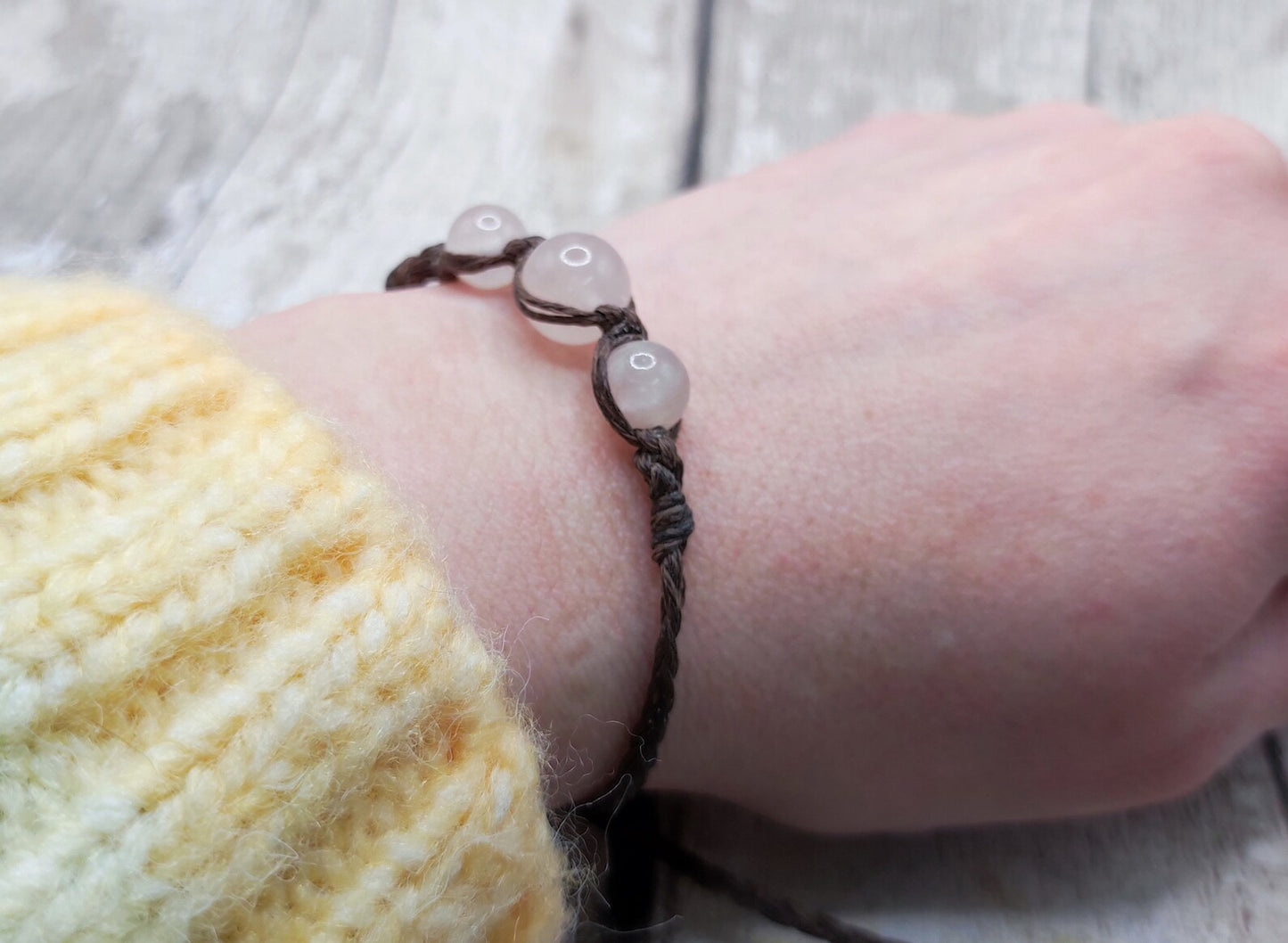 Rose quartz beaded macramé bracelet.