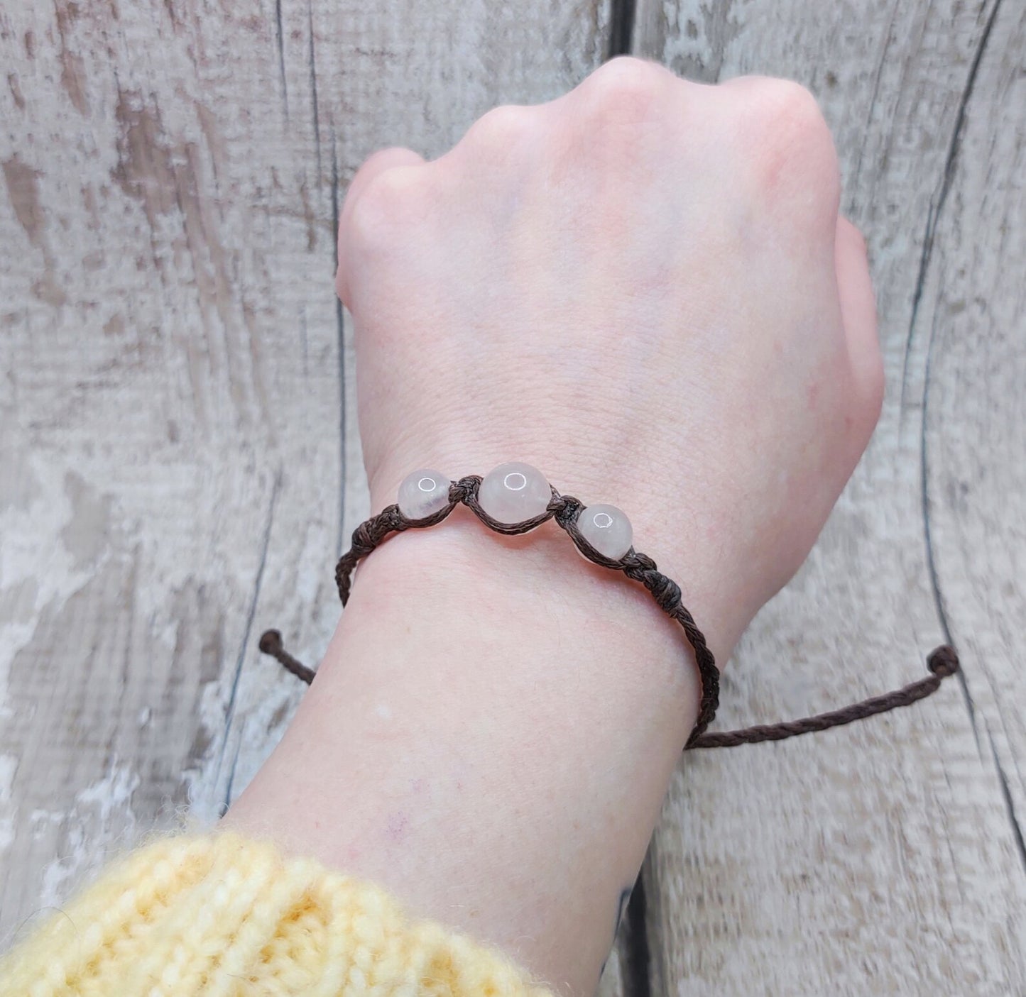 Rose quartz beaded macramé bracelet.