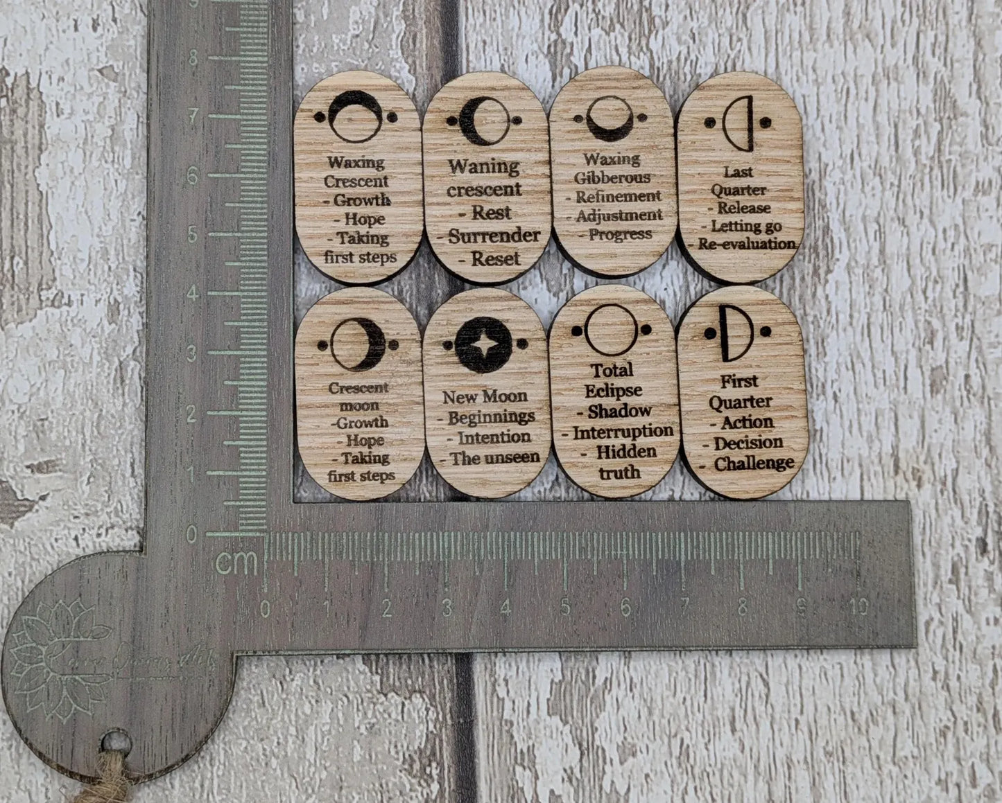Sweet chestnut wooden Moon Glyph tiles beginner set with engraved meaning.