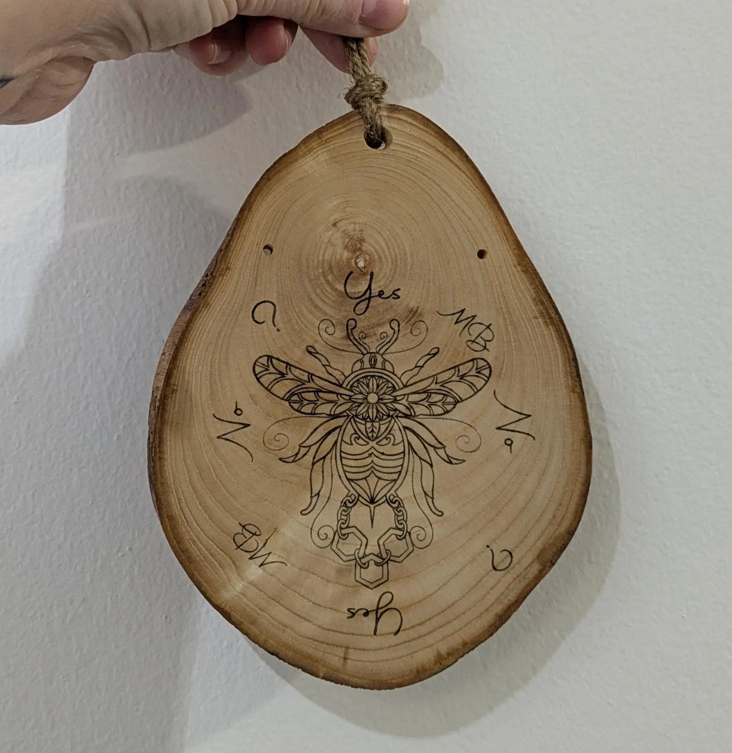 Ash wood hanging gilded bumble bee laser printed pendulum board.