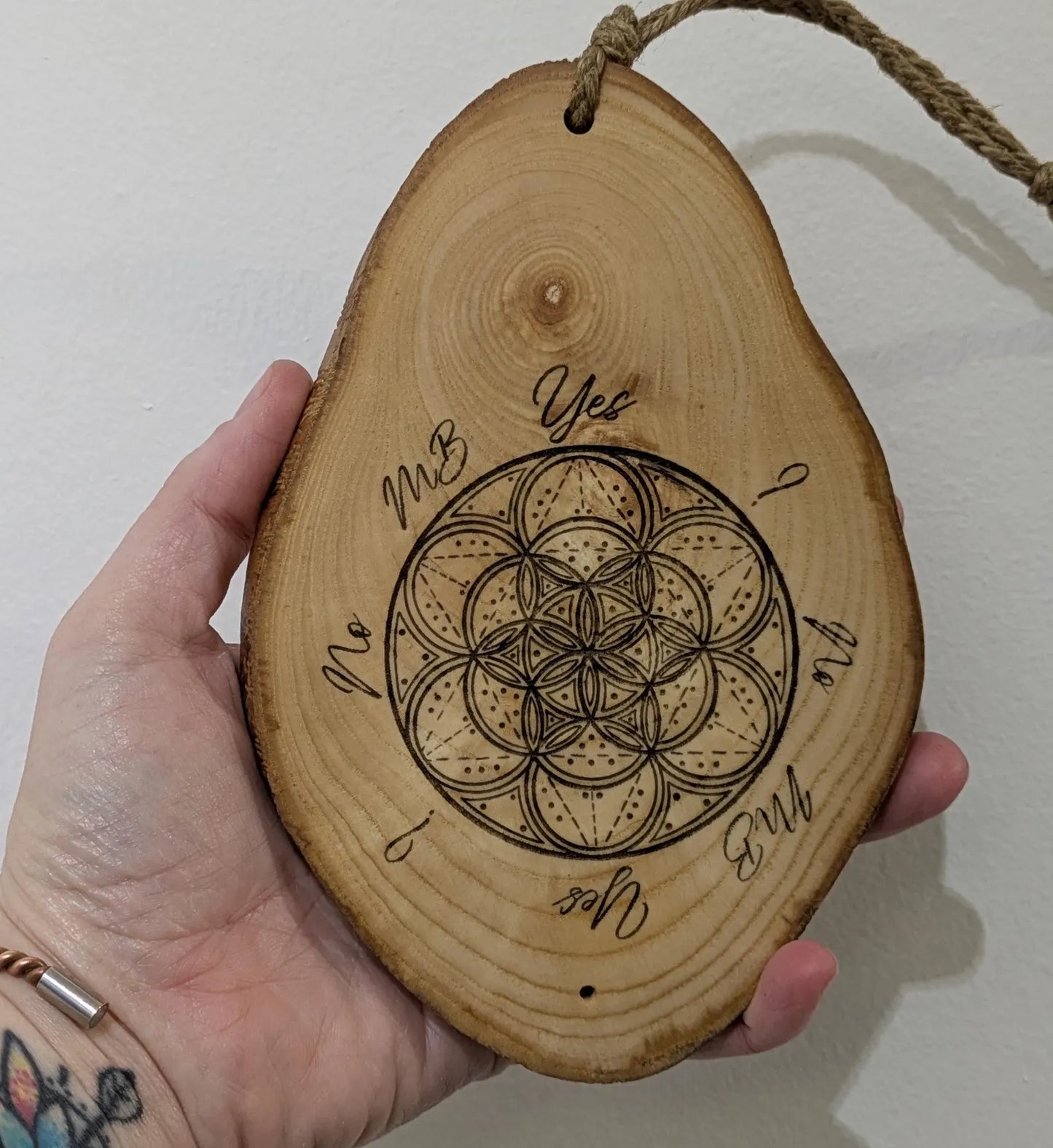 Ash wood geometric laser printed pendulum dowsing board.