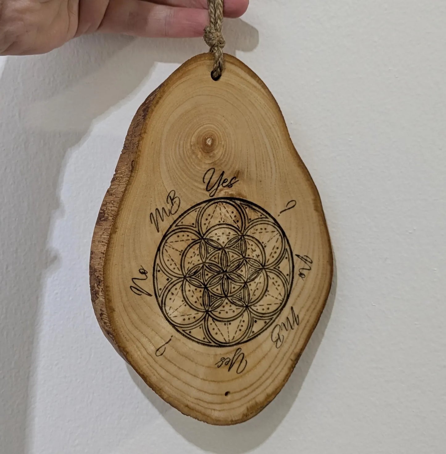 Ash wood geometric laser printed pendulum dowsing board.