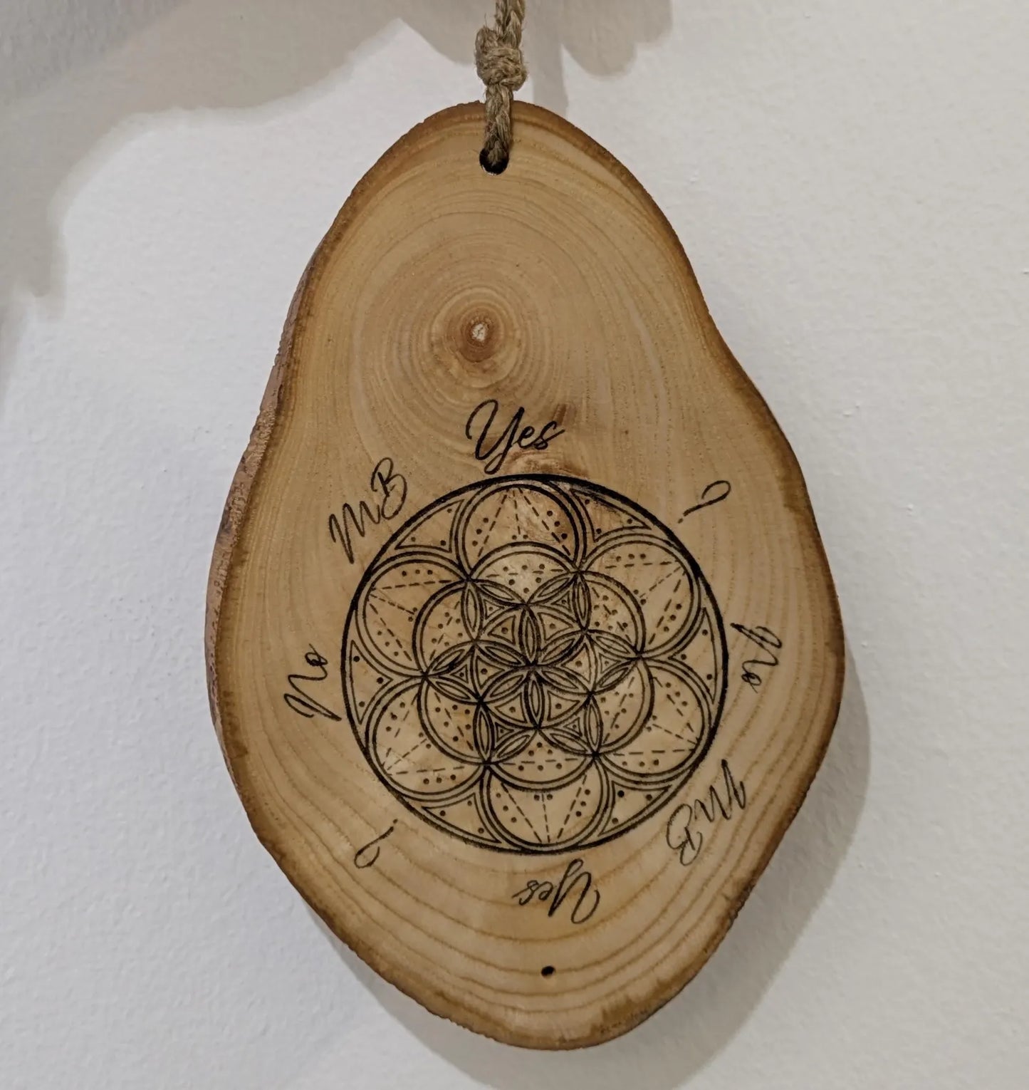 Ash wood geometric laser printed pendulum dowsing board.