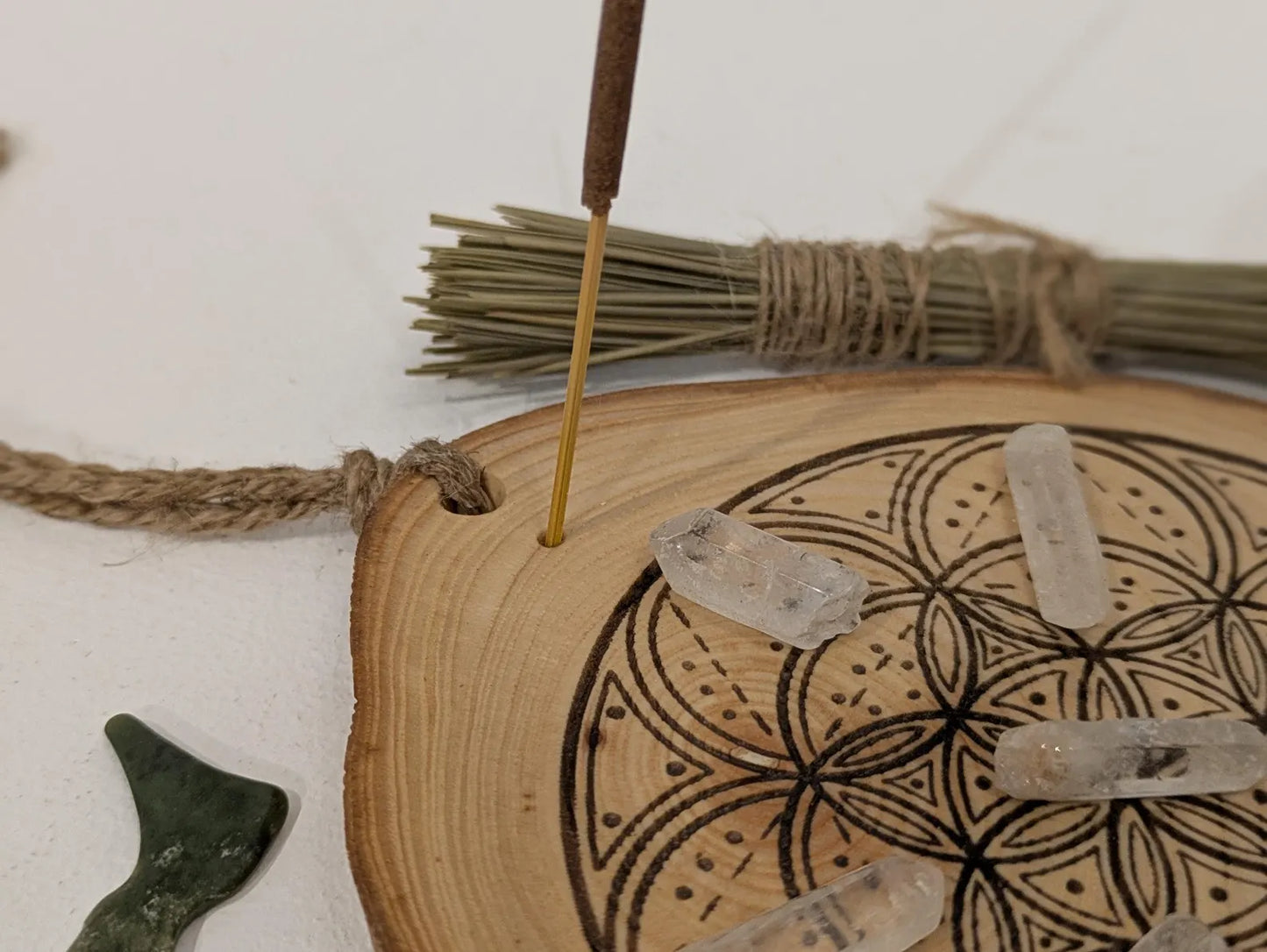 Ash wood hanging crystal grid board with incense drill holes.