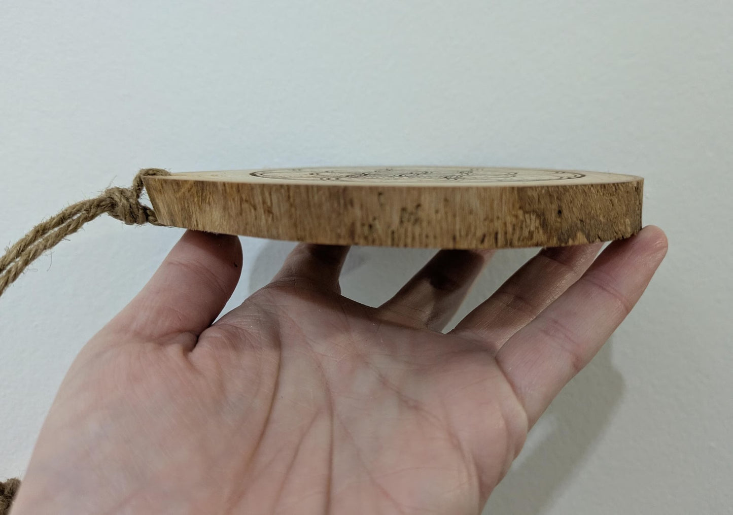 Ash wood hanging crystal grid board with incense drill holes.