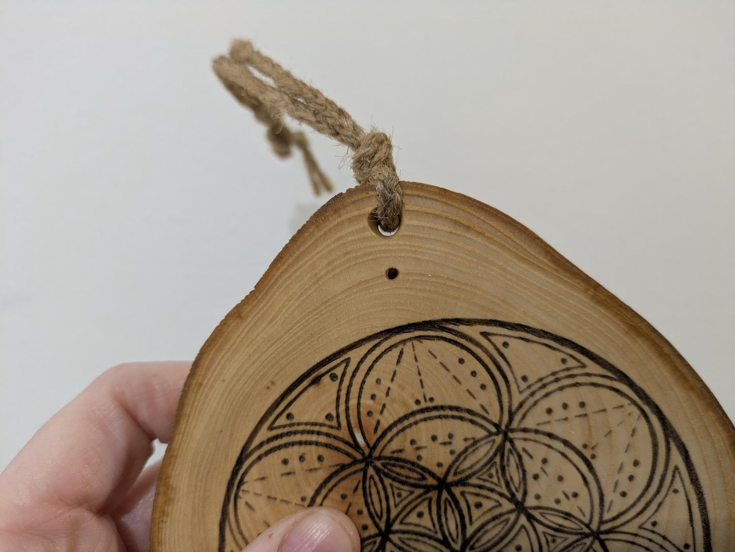 Ash wood hanging crystal grid board with incense drill holes.
