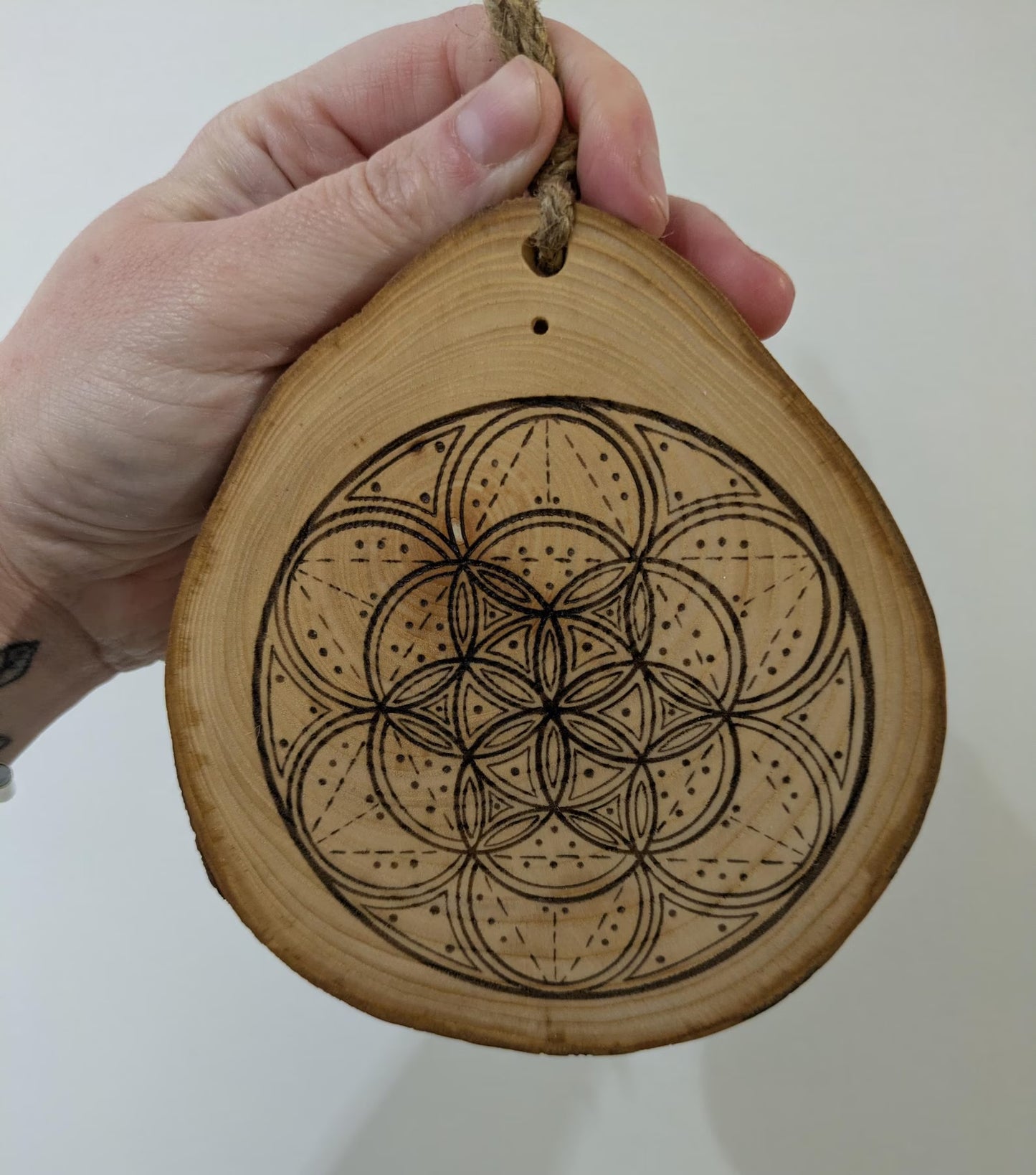 Ash wood hanging crystal grid board with incense drill holes.