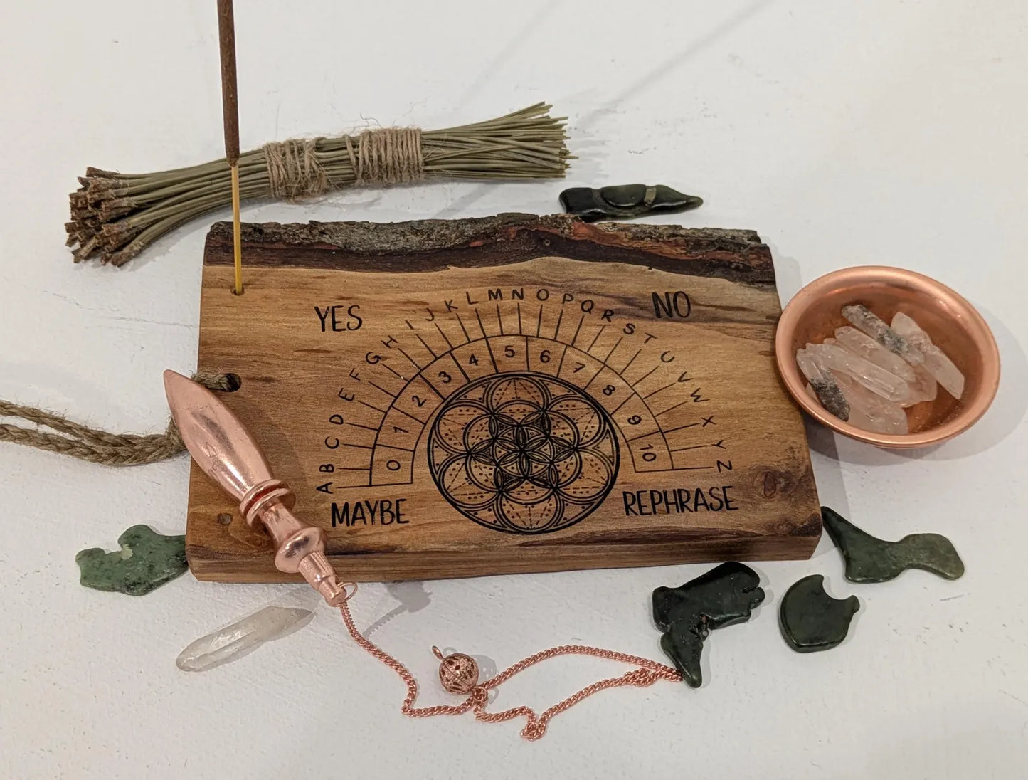 Alder wood hanging alphabet pendulum board with incense holder.