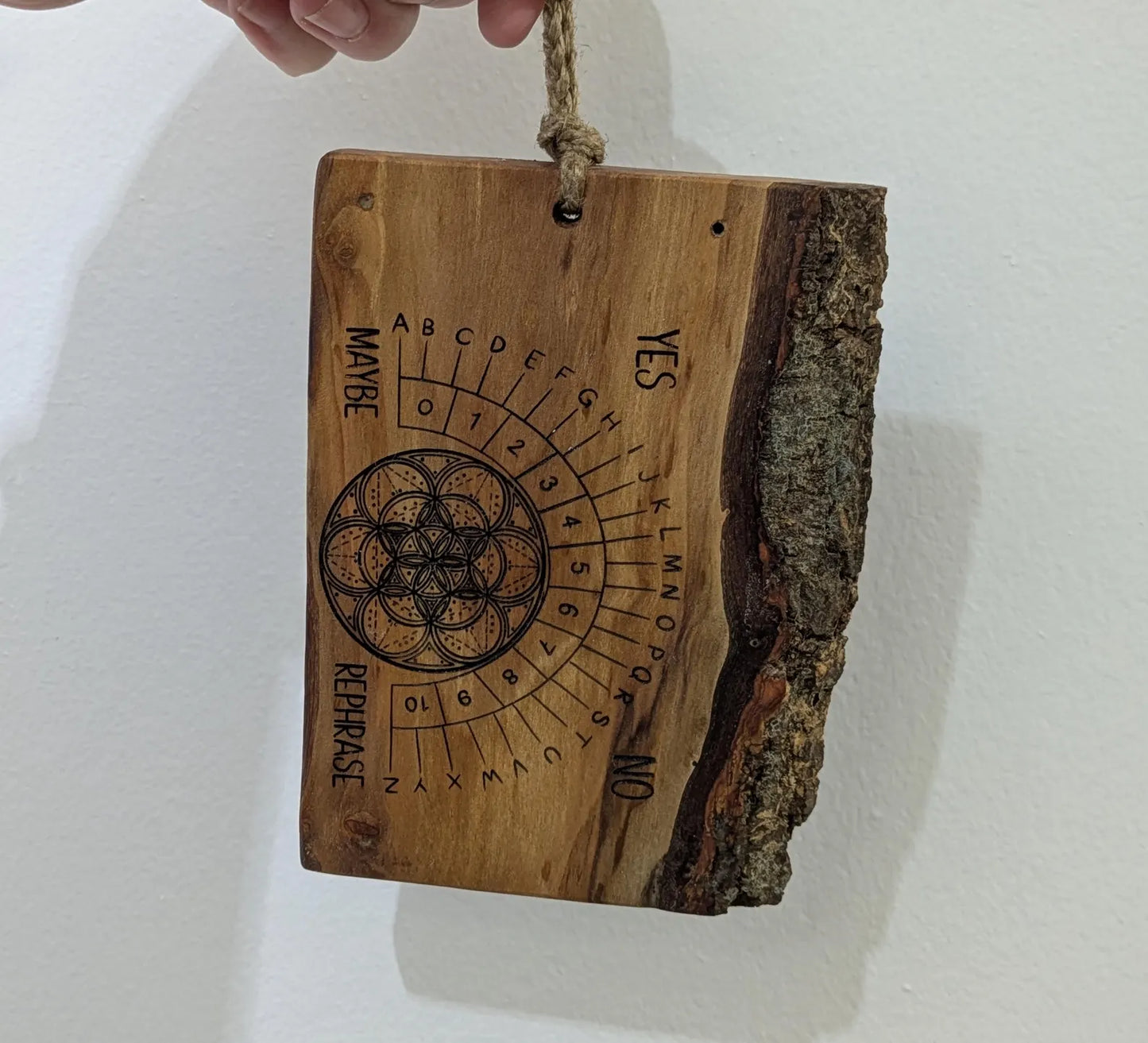 Alder wood hanging alphabet pendulum board with incense holder.