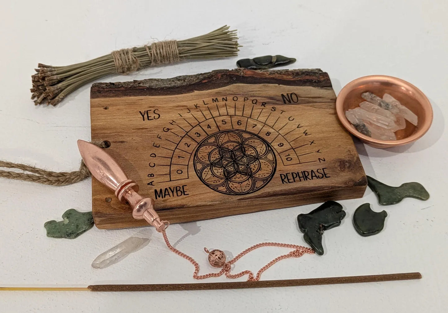 Alder wood hanging alphabet pendulum board with incense holder.