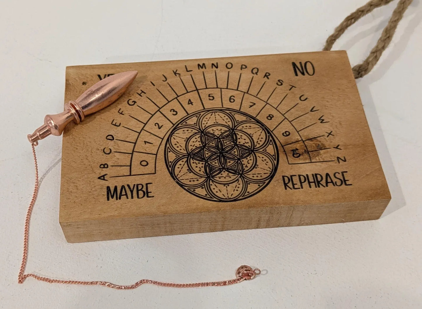 Lime wood hanging Alphabet dowsing pendulum board.