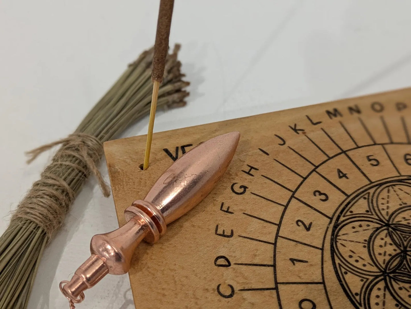 Lime wood hanging Alphabet dowsing pendulum board.
