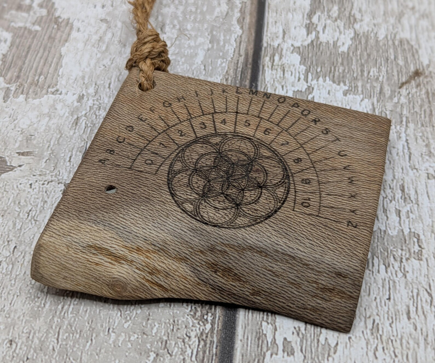 Lace wood mini pocket sized alphabet dowsing board with waney edge.