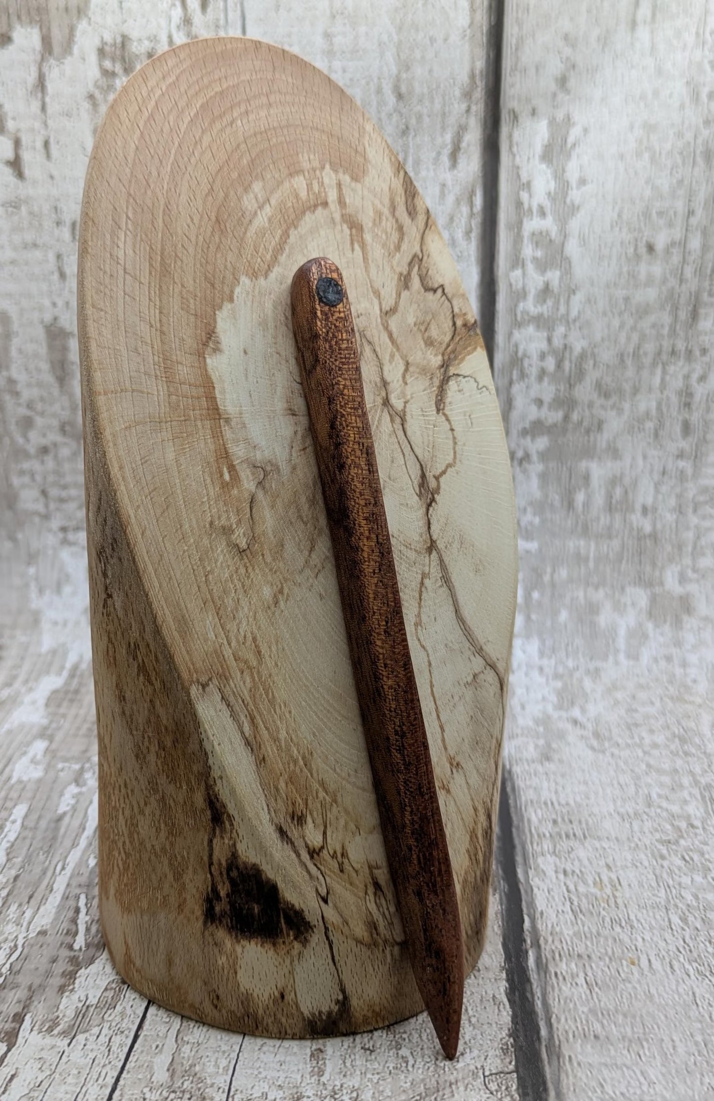 Sepele mahogany wood with blue kyanite inlay.