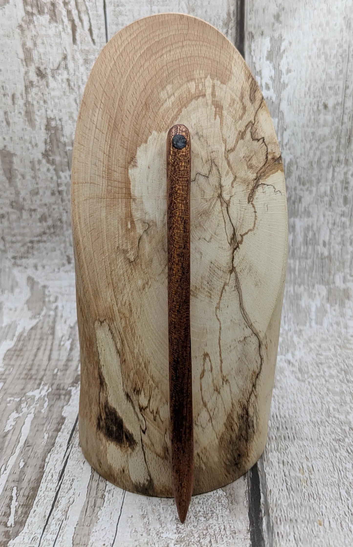 Sepele mahogany wood with blue kyanite inlay.