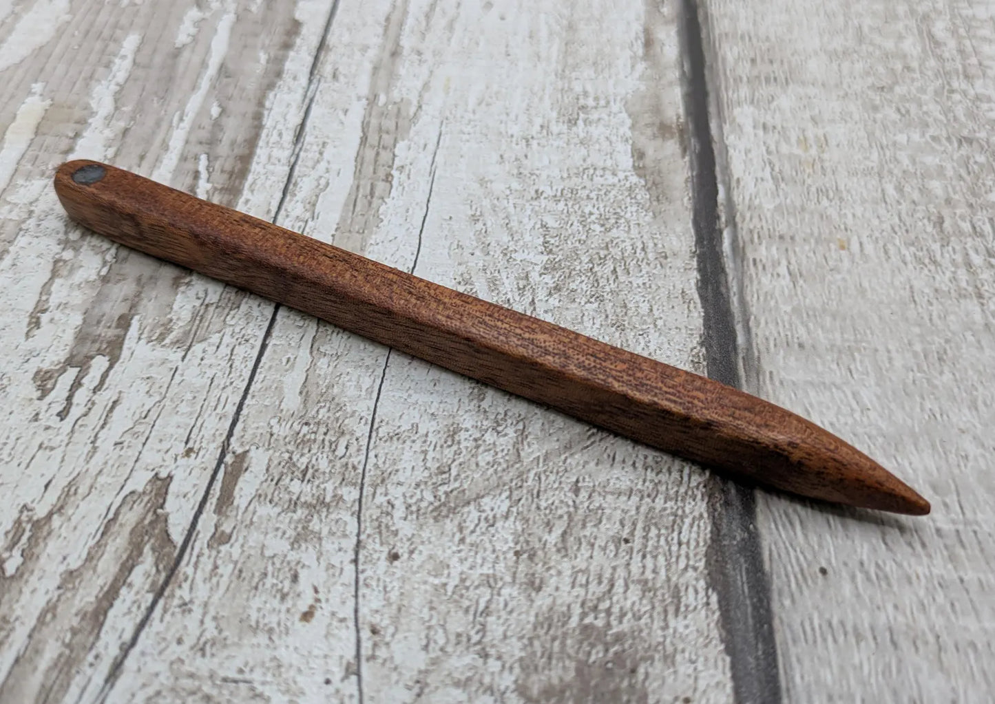 Sepele mahogany wood with blue kyanite inlay.