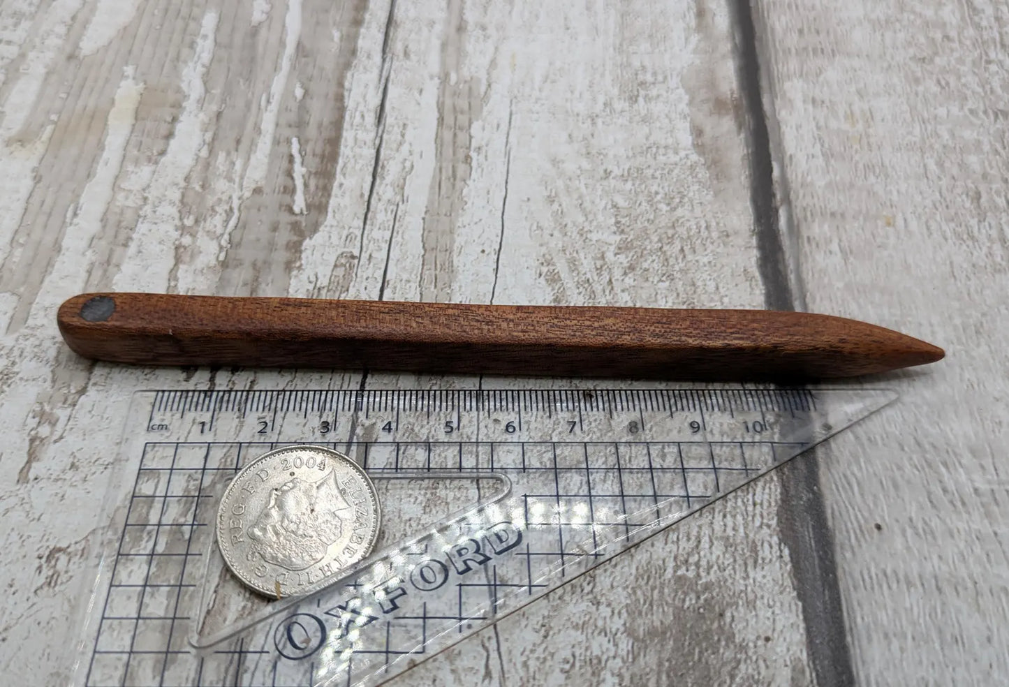 Sepele mahogany wood with blue kyanite inlay.