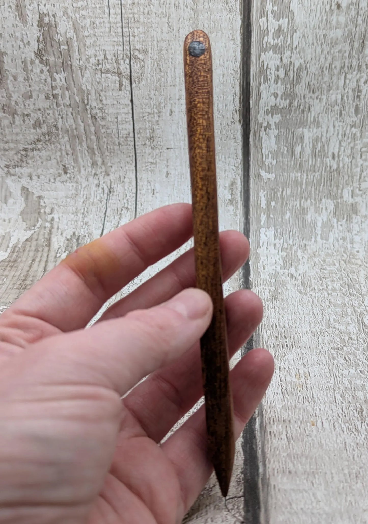 Sepele mahogany wood with blue kyanite inlay.