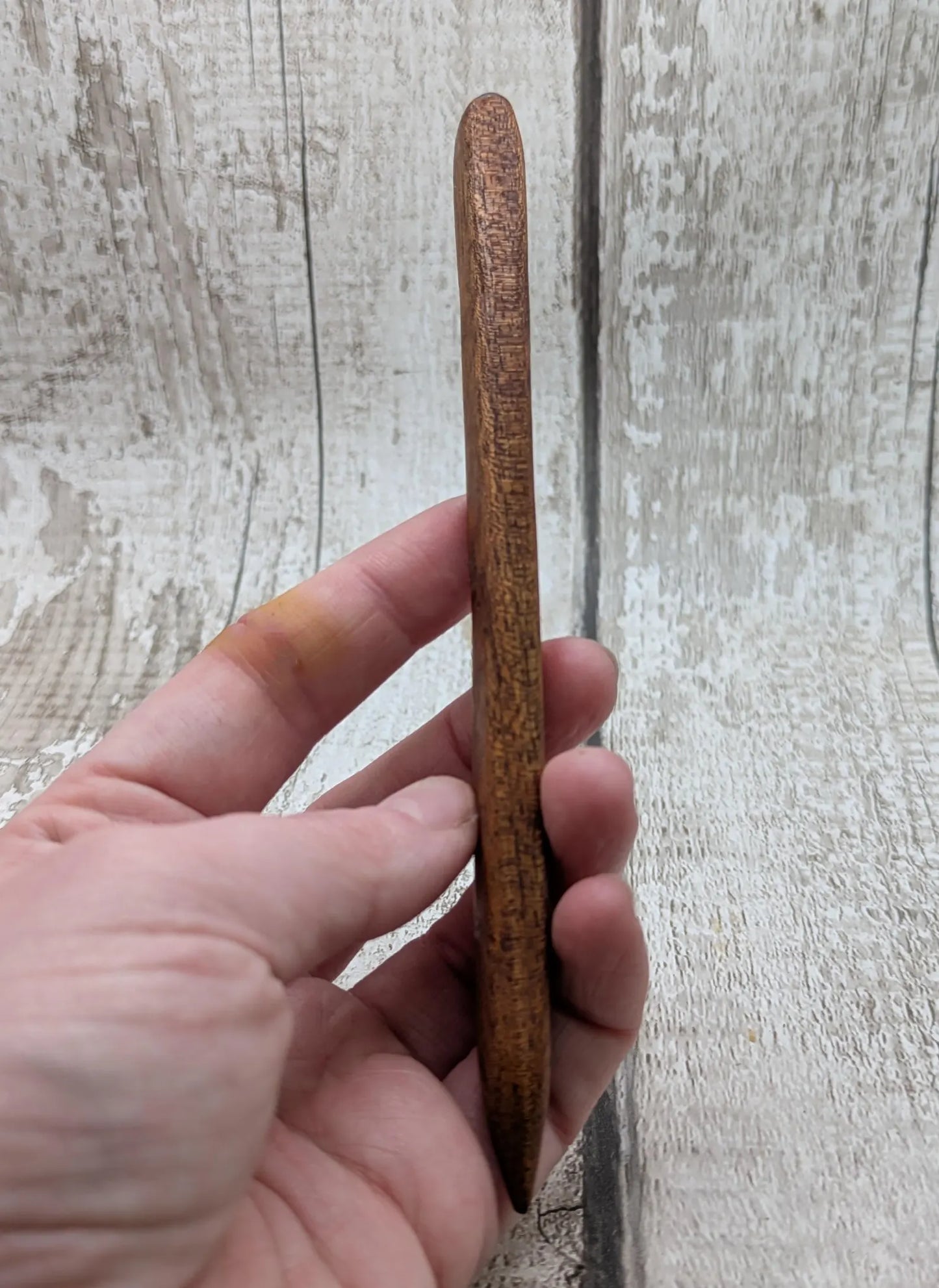 Sepele mahogany wood with blue kyanite inlay.