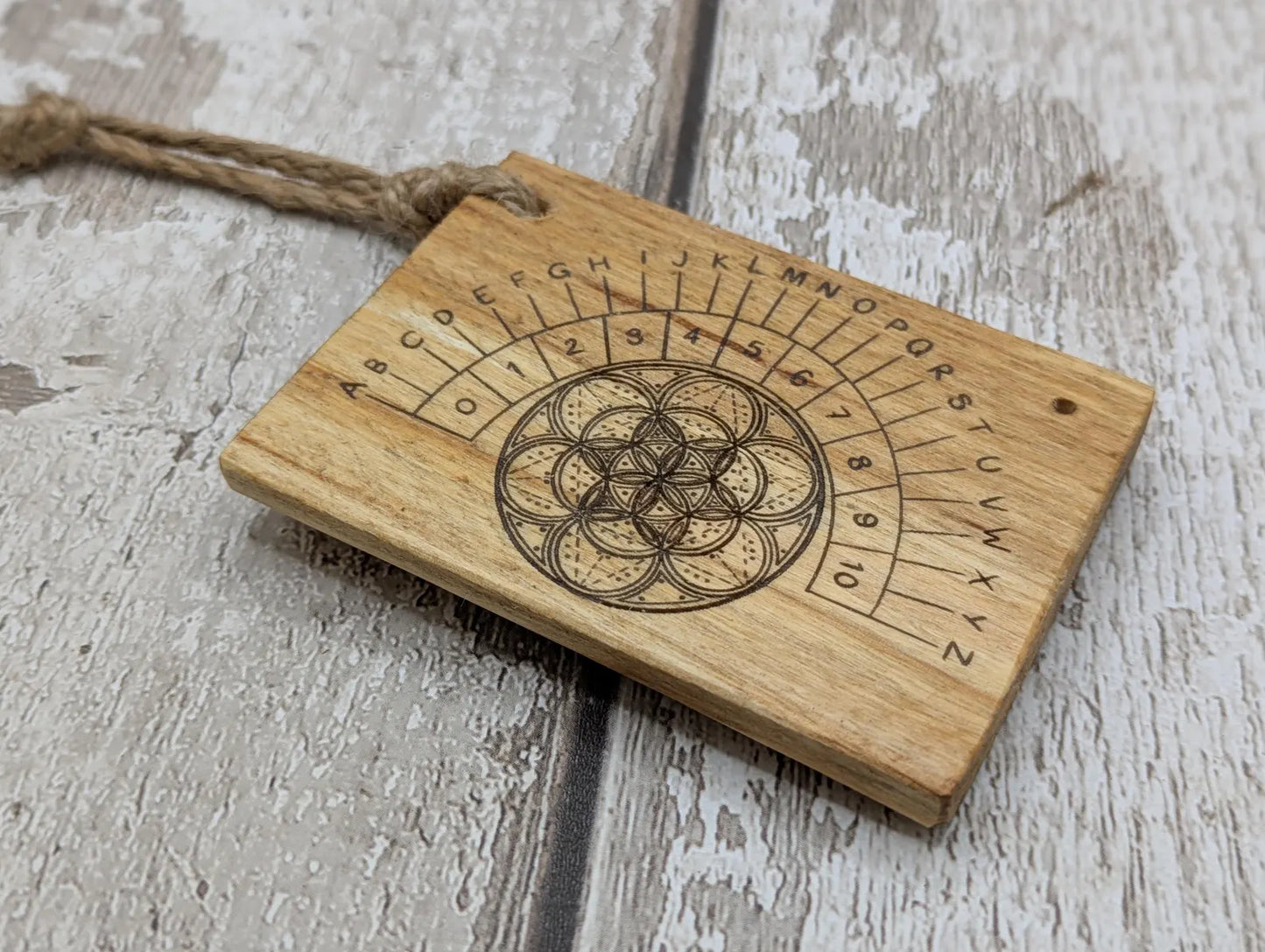 Lime wood pocket sized mini alphabet pendulum dowsing board.