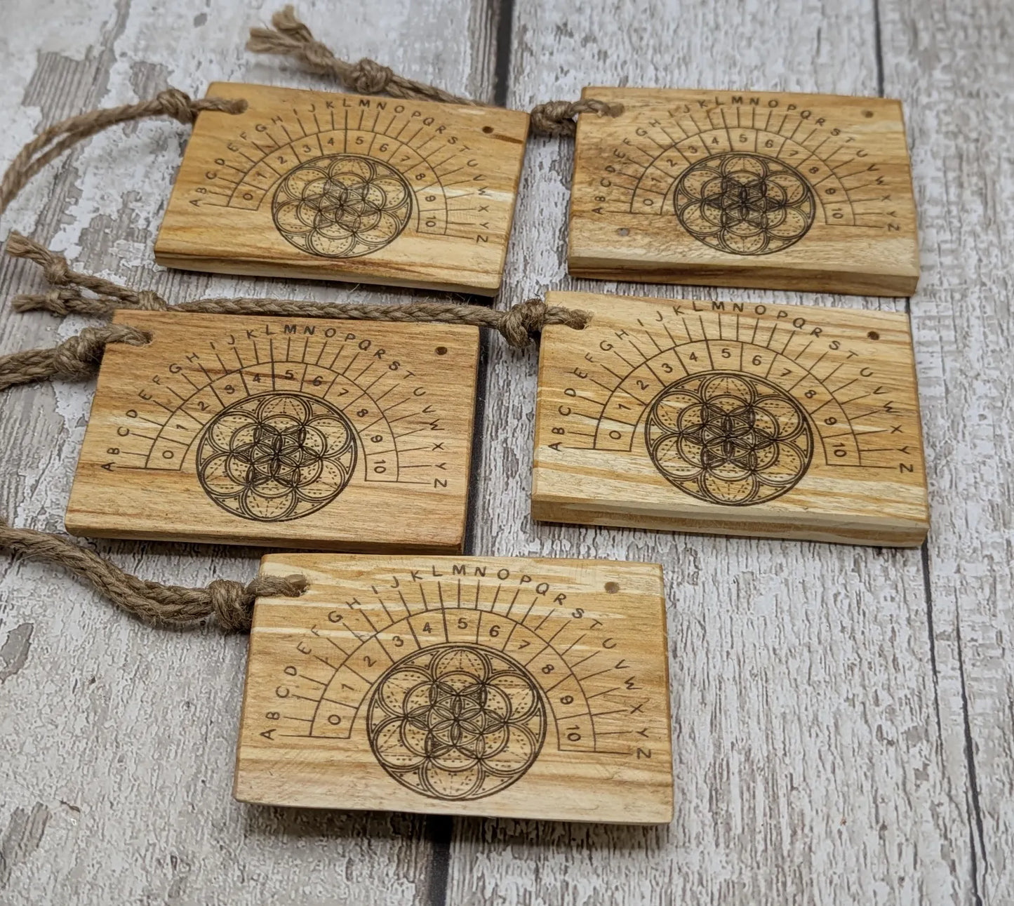 Lime wood pocket sized mini alphabet pendulum dowsing board.