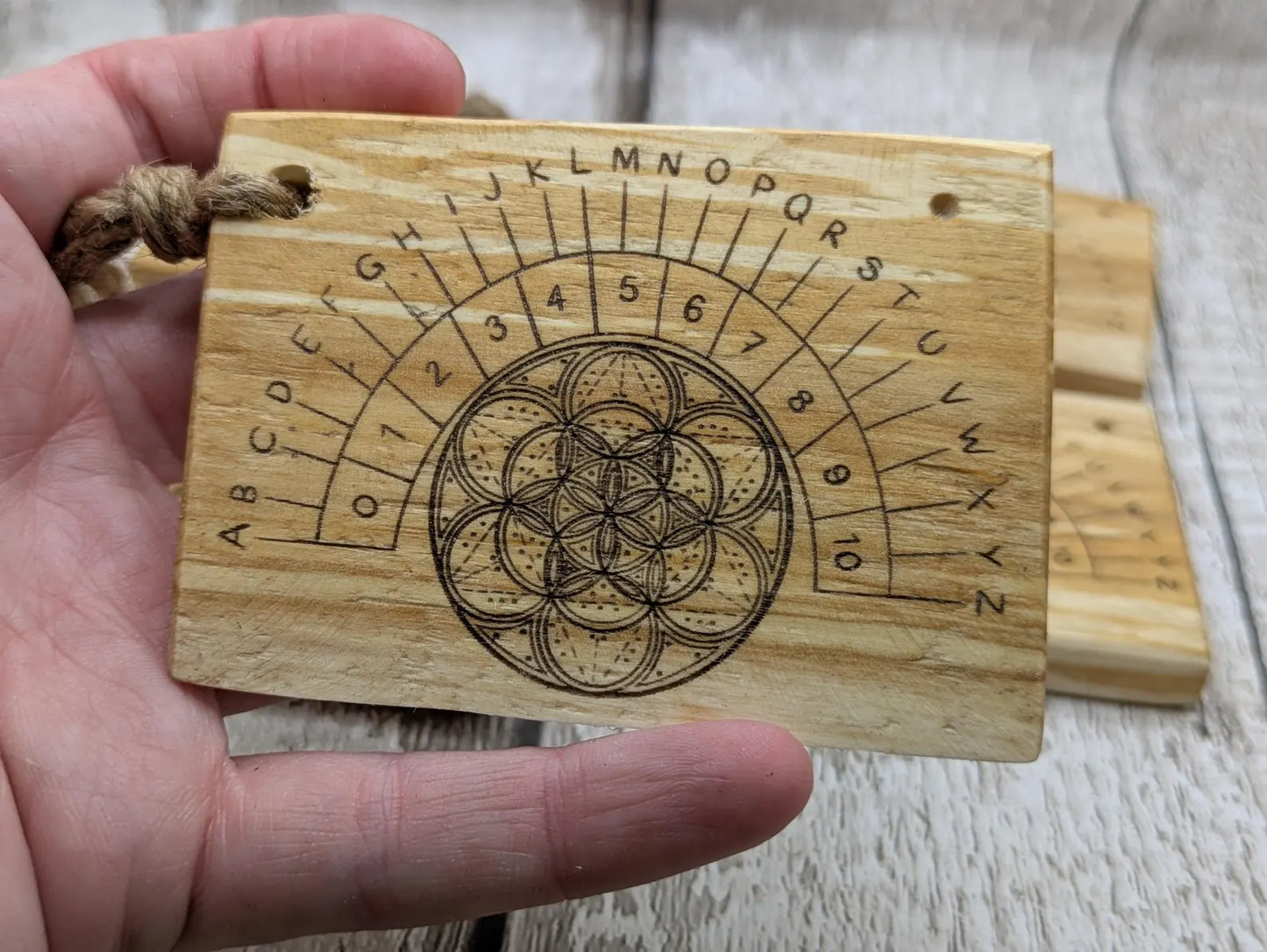 Lime wood pocket sized mini alphabet pendulum dowsing board.