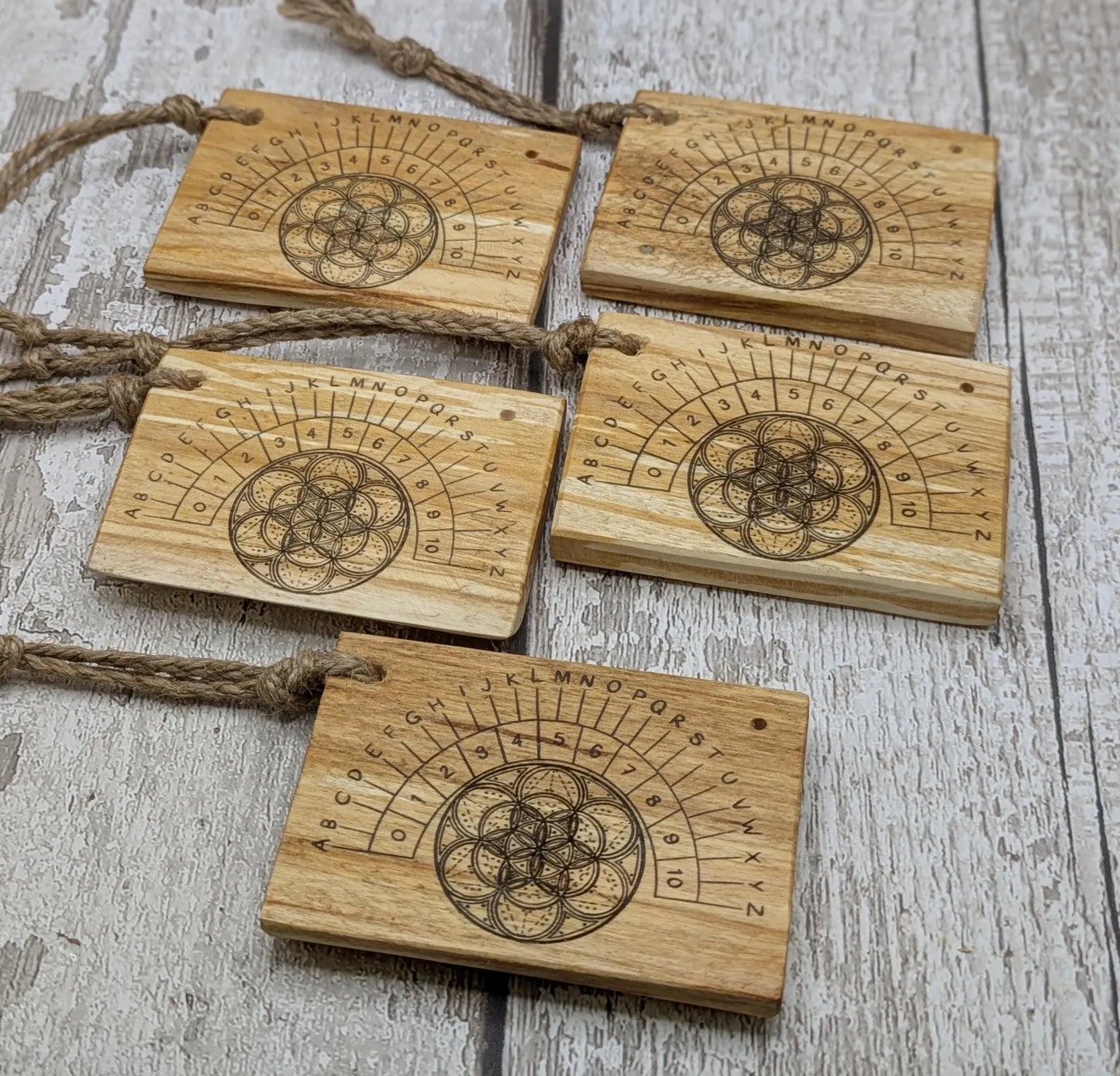 Lime wood pocket sized mini alphabet pendulum dowsing board.
