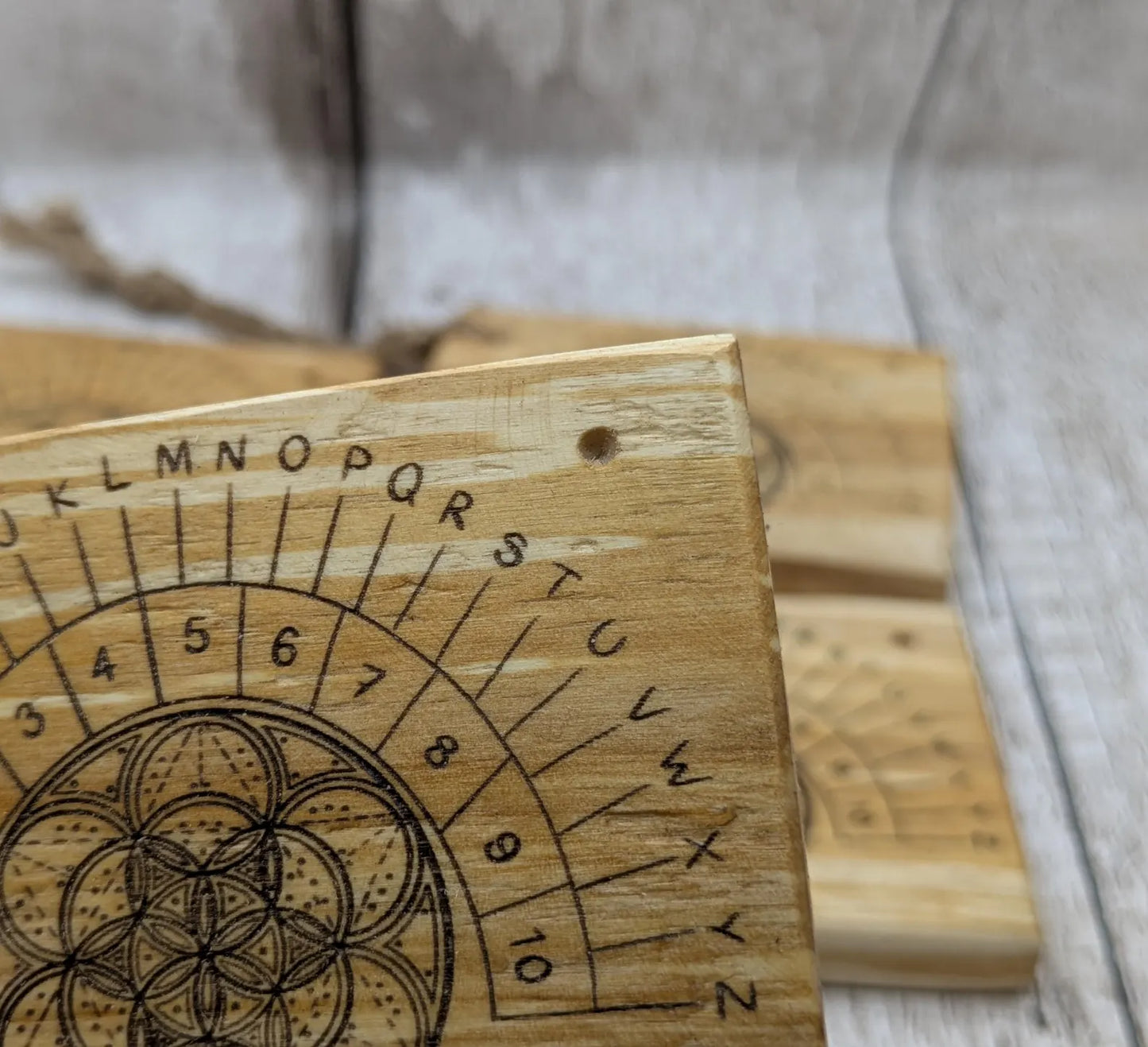 Lime wood pocket sized mini alphabet pendulum dowsing board.