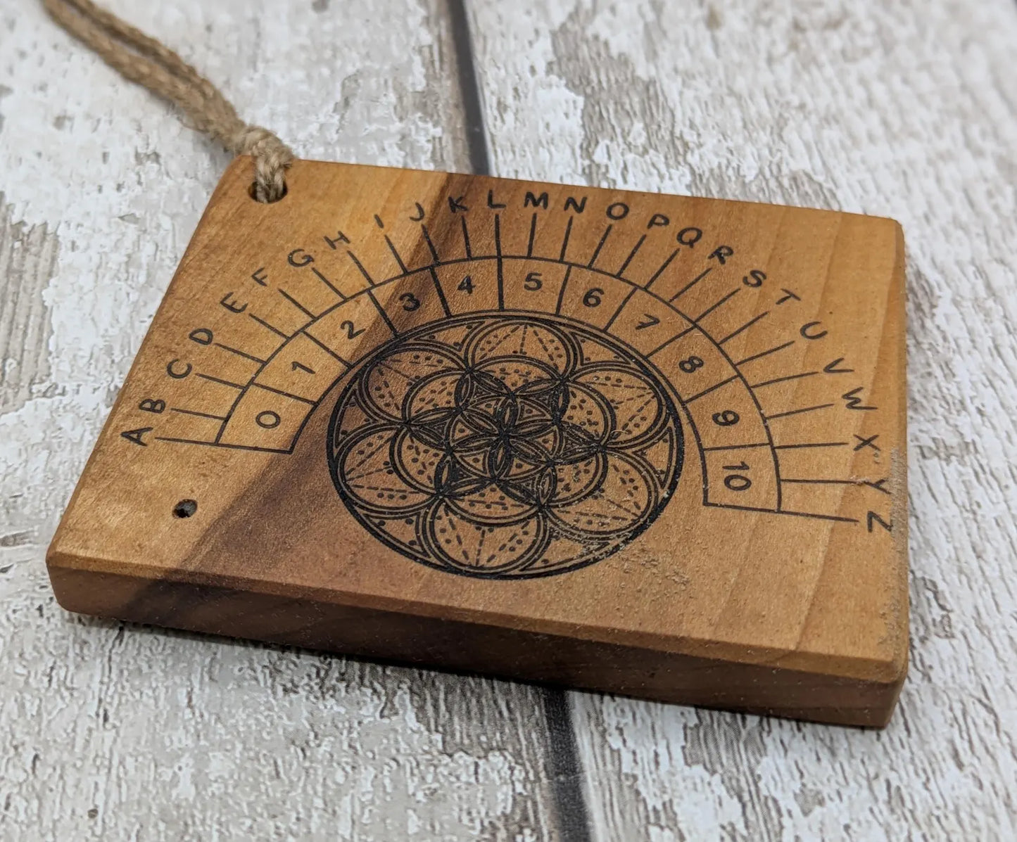 Alder board alphabet dowsing pendulum board.
