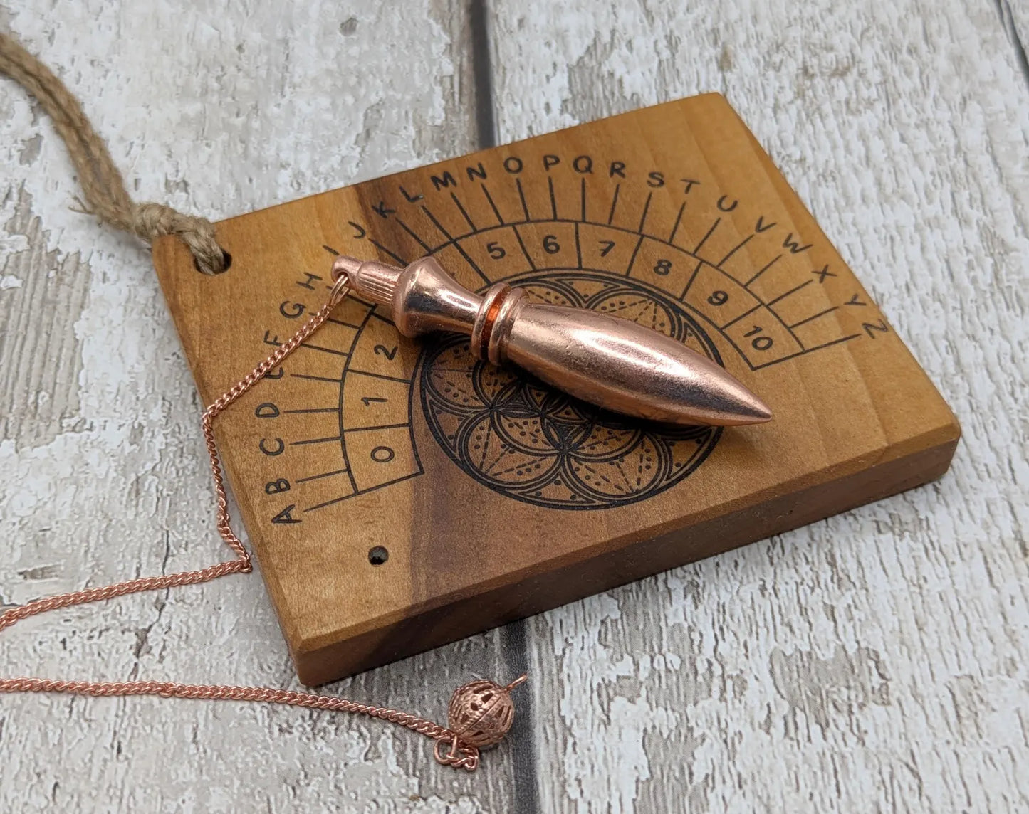 Alder board alphabet dowsing pendulum board.