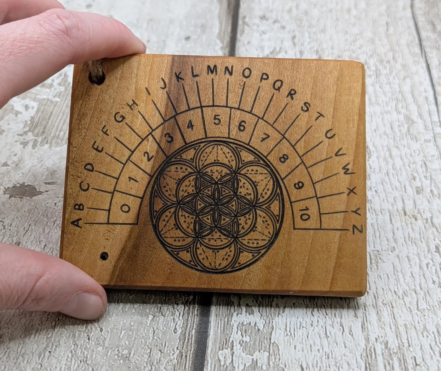 Alder board alphabet dowsing pendulum board.