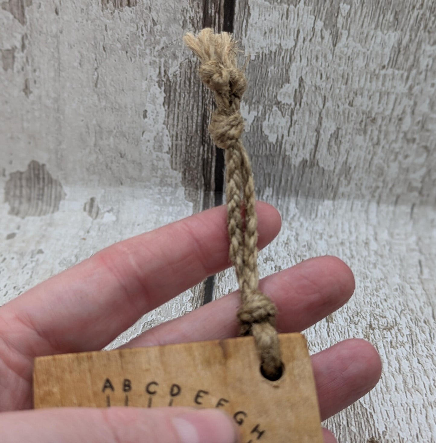 Alder wood mini pocket sized alphabet dowsing pendulum board.