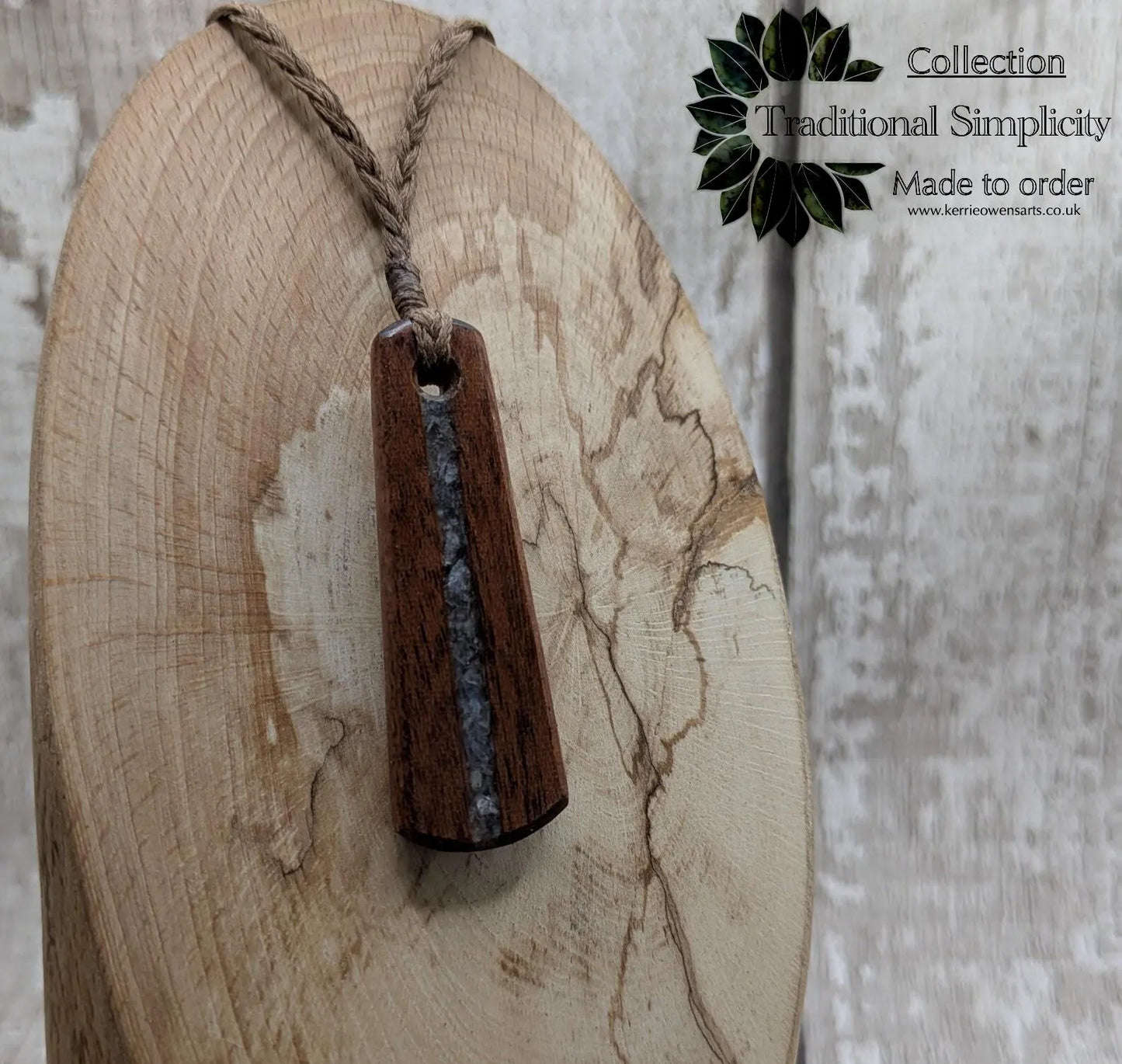 Made to order Sepele mahogany roimata teardrop pendant with blue kyanite inlay.