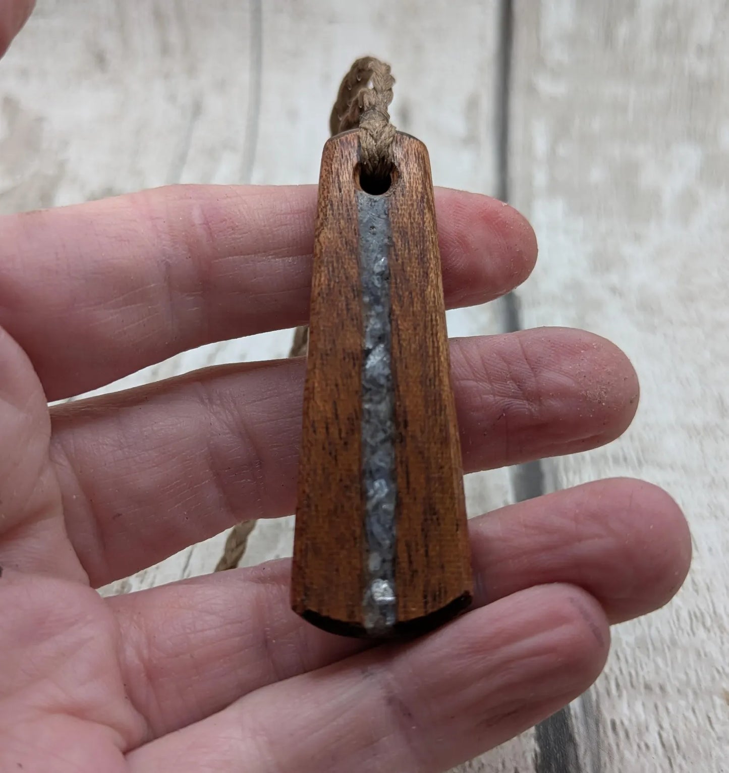 Made to order Sepele mahogany roimata teardrop pendant with blue kyanite inlay.