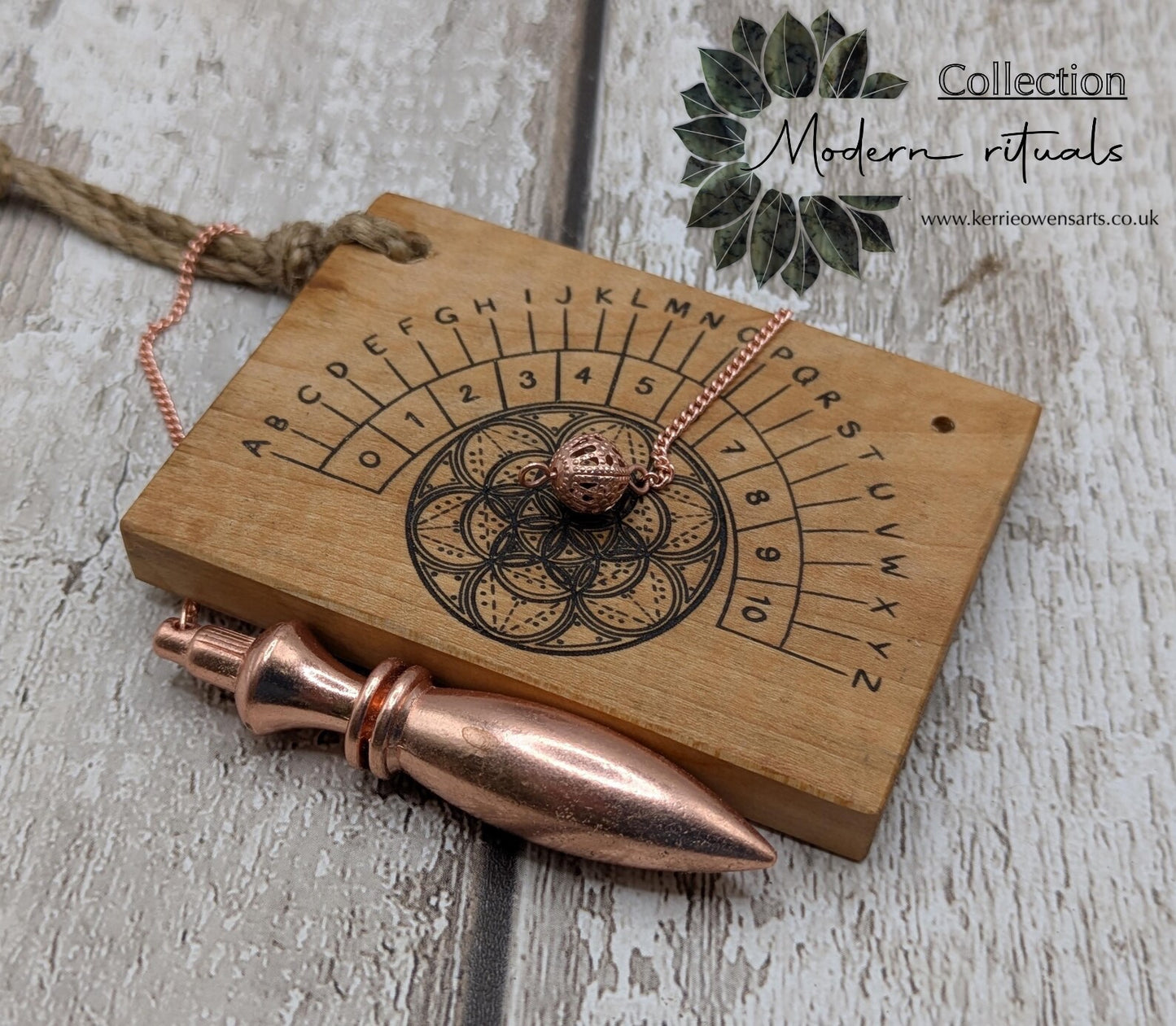 Alder wood mini pocket sized alphabet dowsing pendulum board.