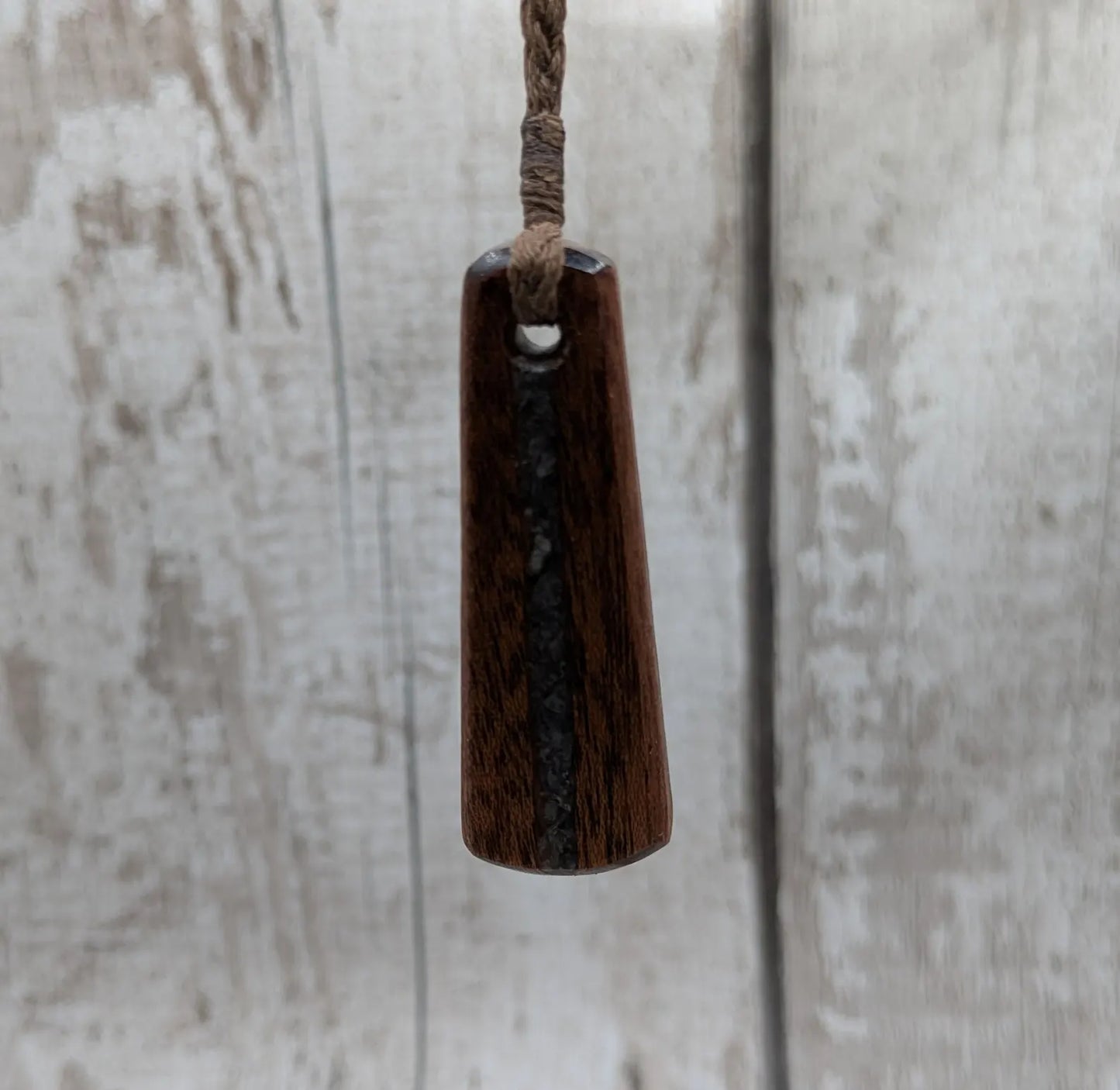 Made to order Sepele mahogany roimata teardrop pendant with blue kyanite inlay.