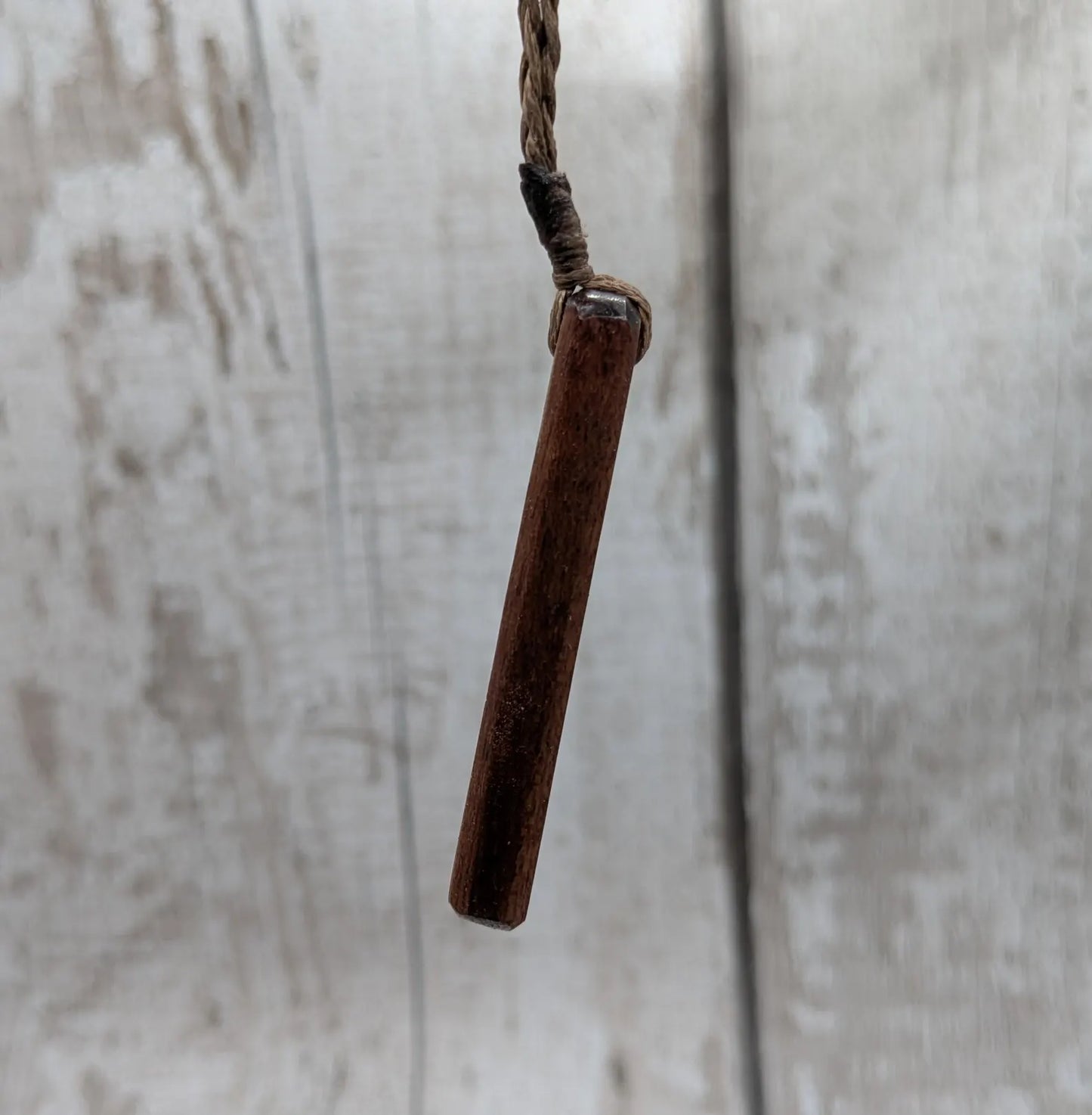 Made to order Sepele mahogany roimata teardrop pendant with blue kyanite inlay.