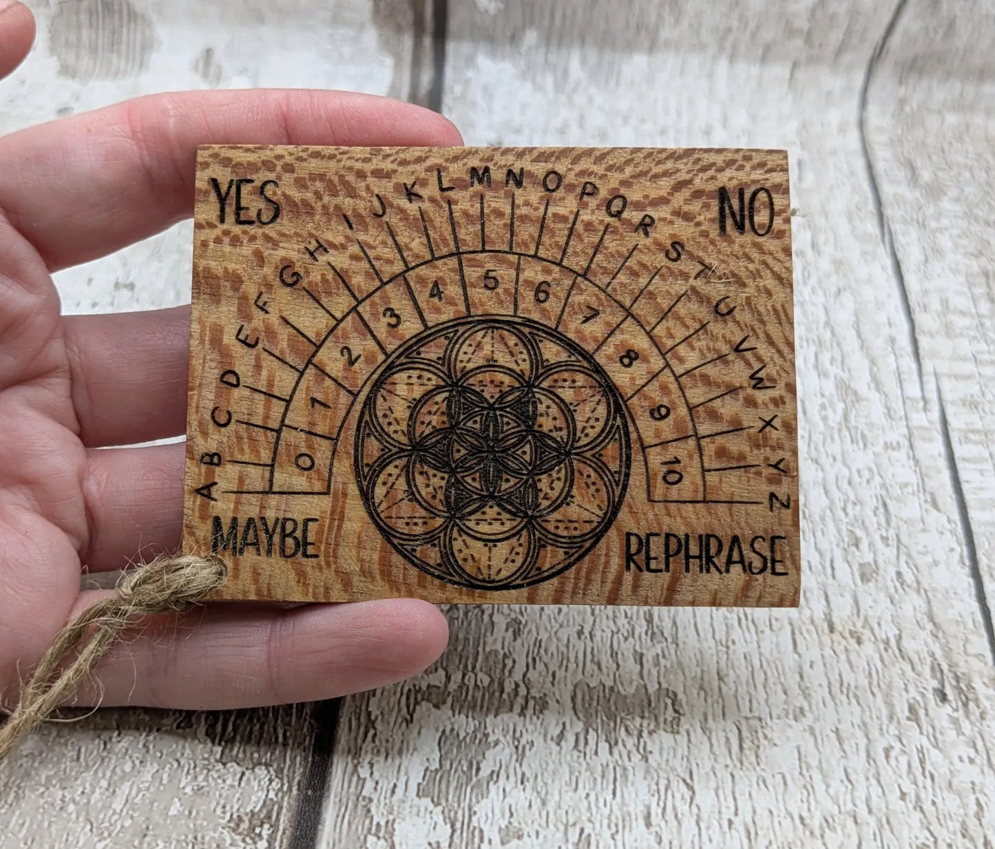 Lace wood mini pocket sized pendulum dowsing board.