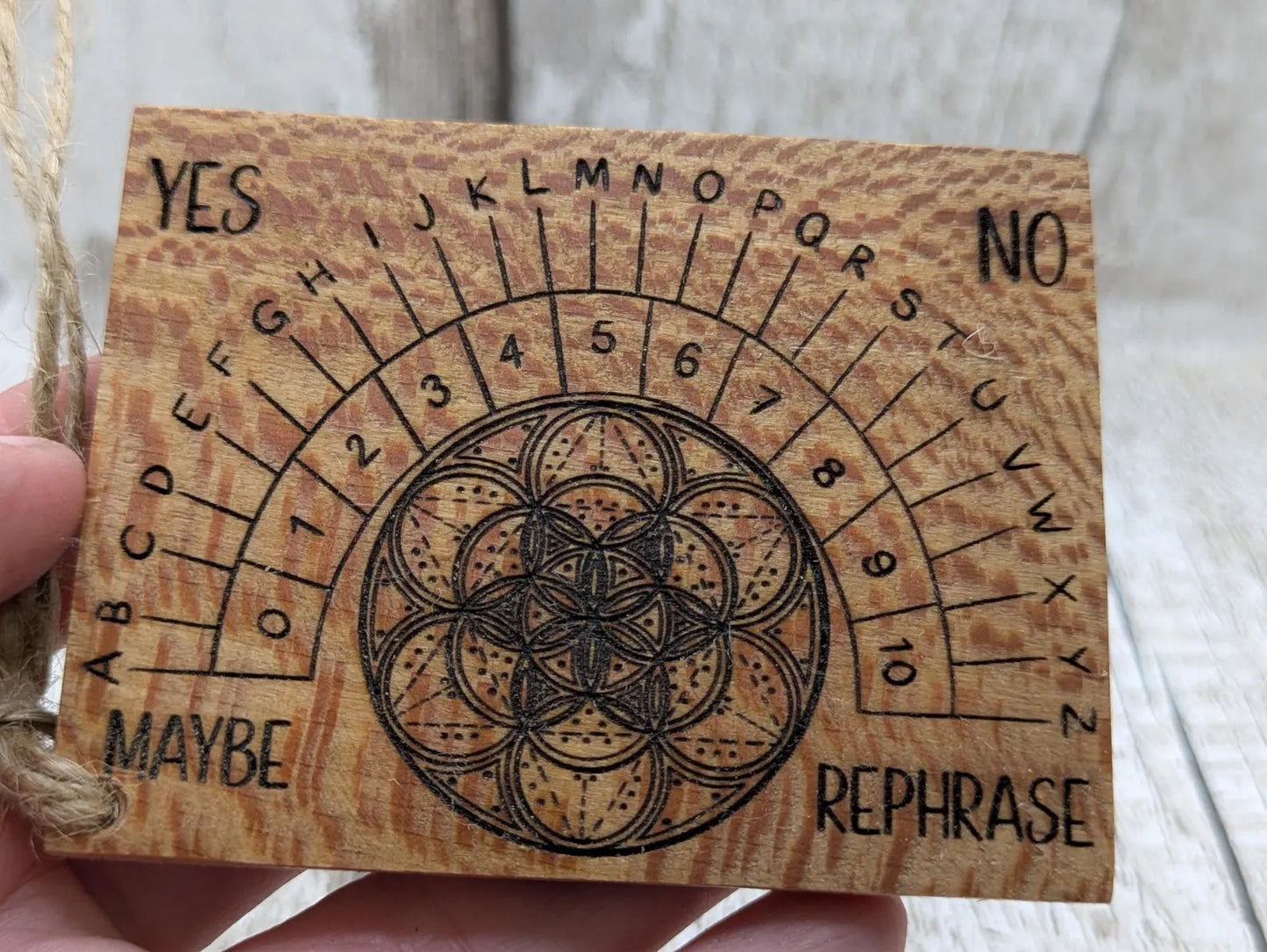 Lace wood mini pocket sized pendulum dowsing board.
