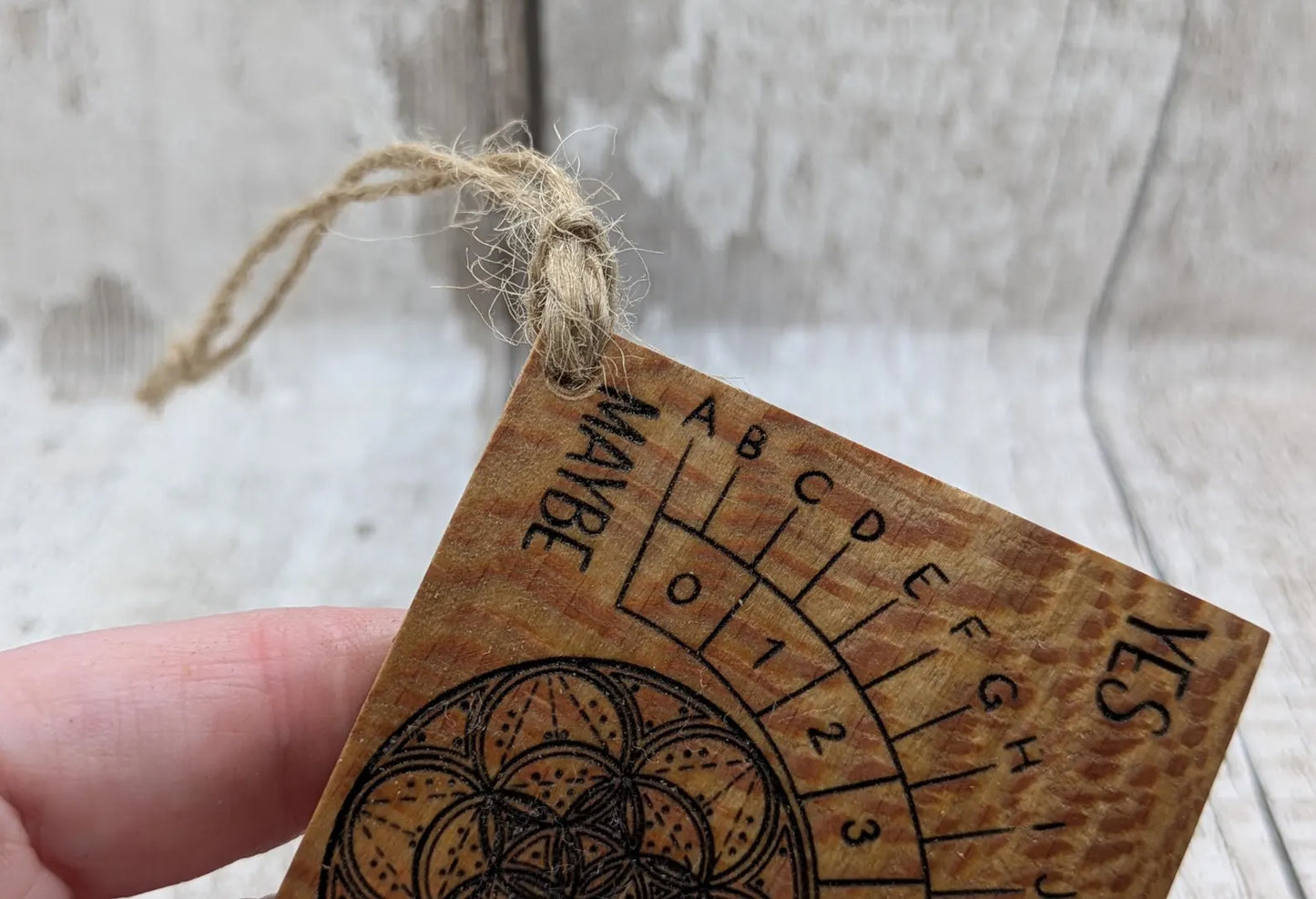 Lace wood mini pocket sized pendulum dowsing board.