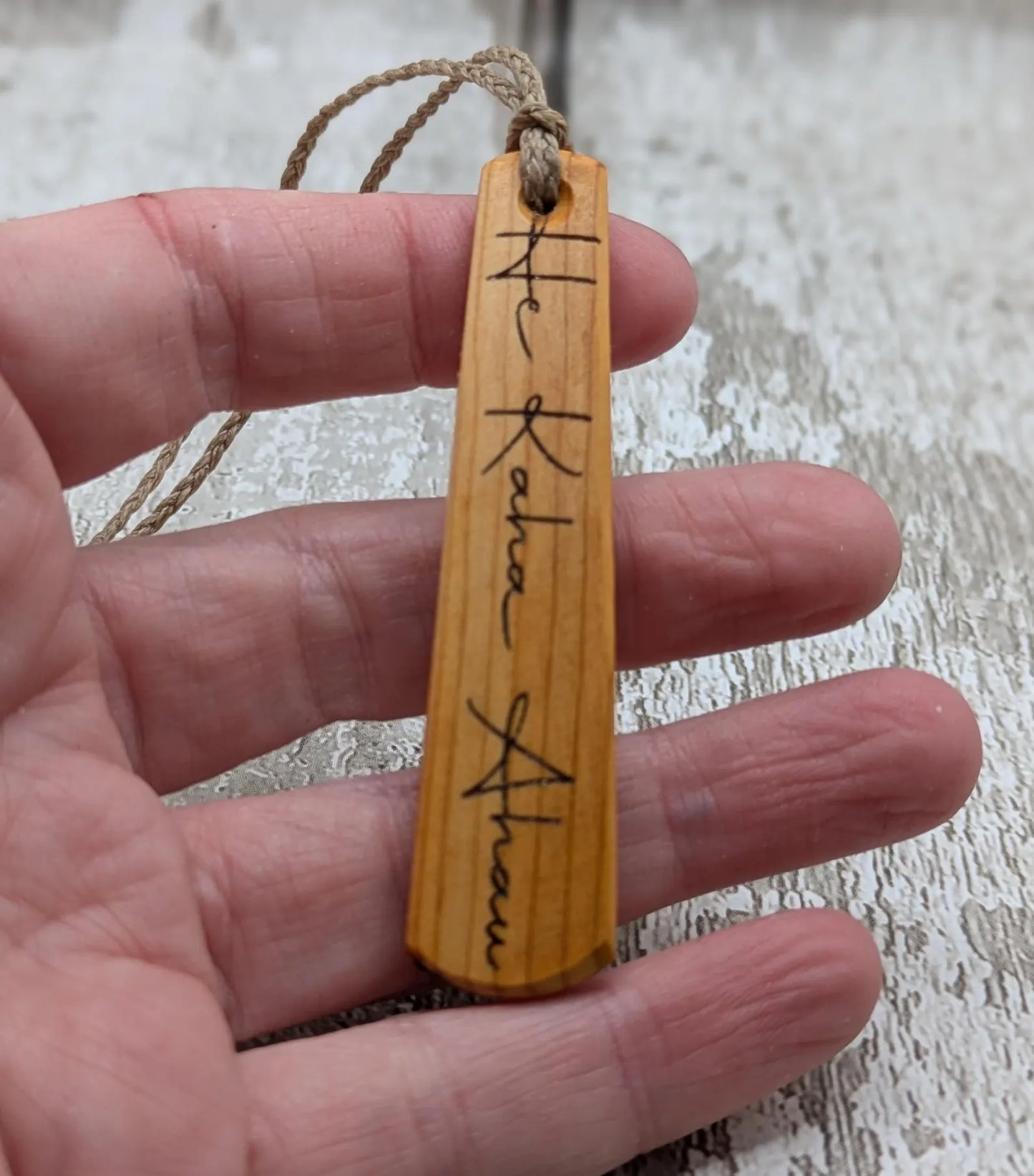 Yew wood roimata drop pendant with te reo māori “He kaha ahau”, I am strong affirmation.