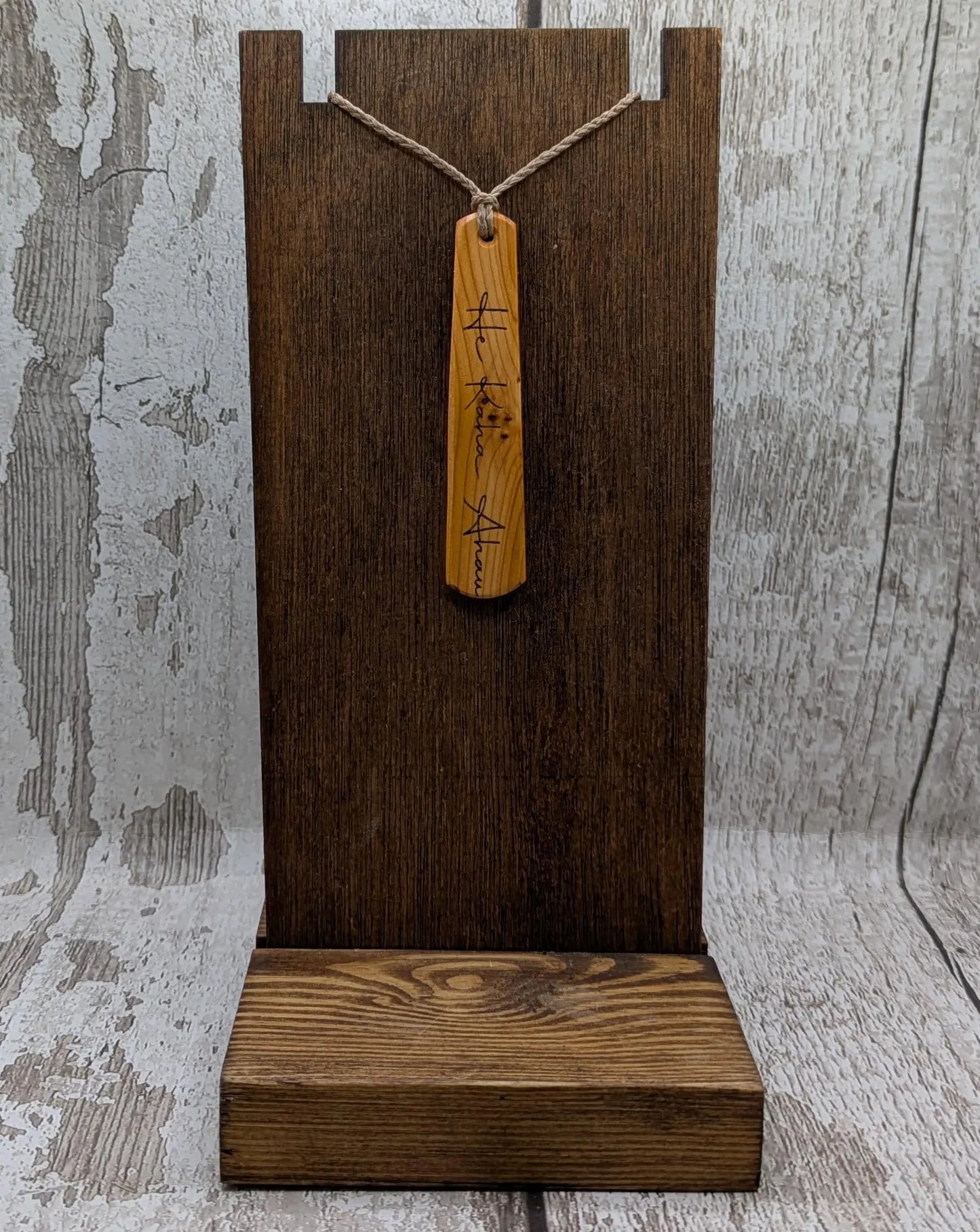 Yew wood roimata pendant with te reo māori He kaha ahau, I am strong.