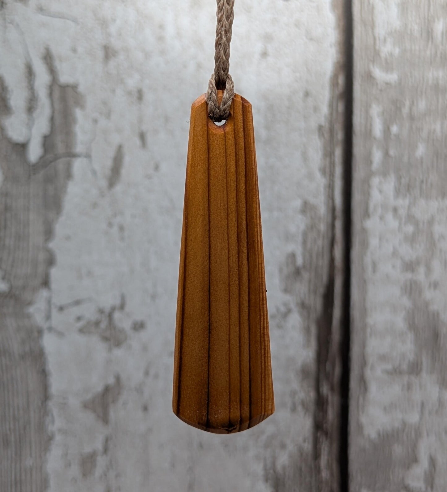 Yew wood roimata drop pendant with breathe mantra laser print.