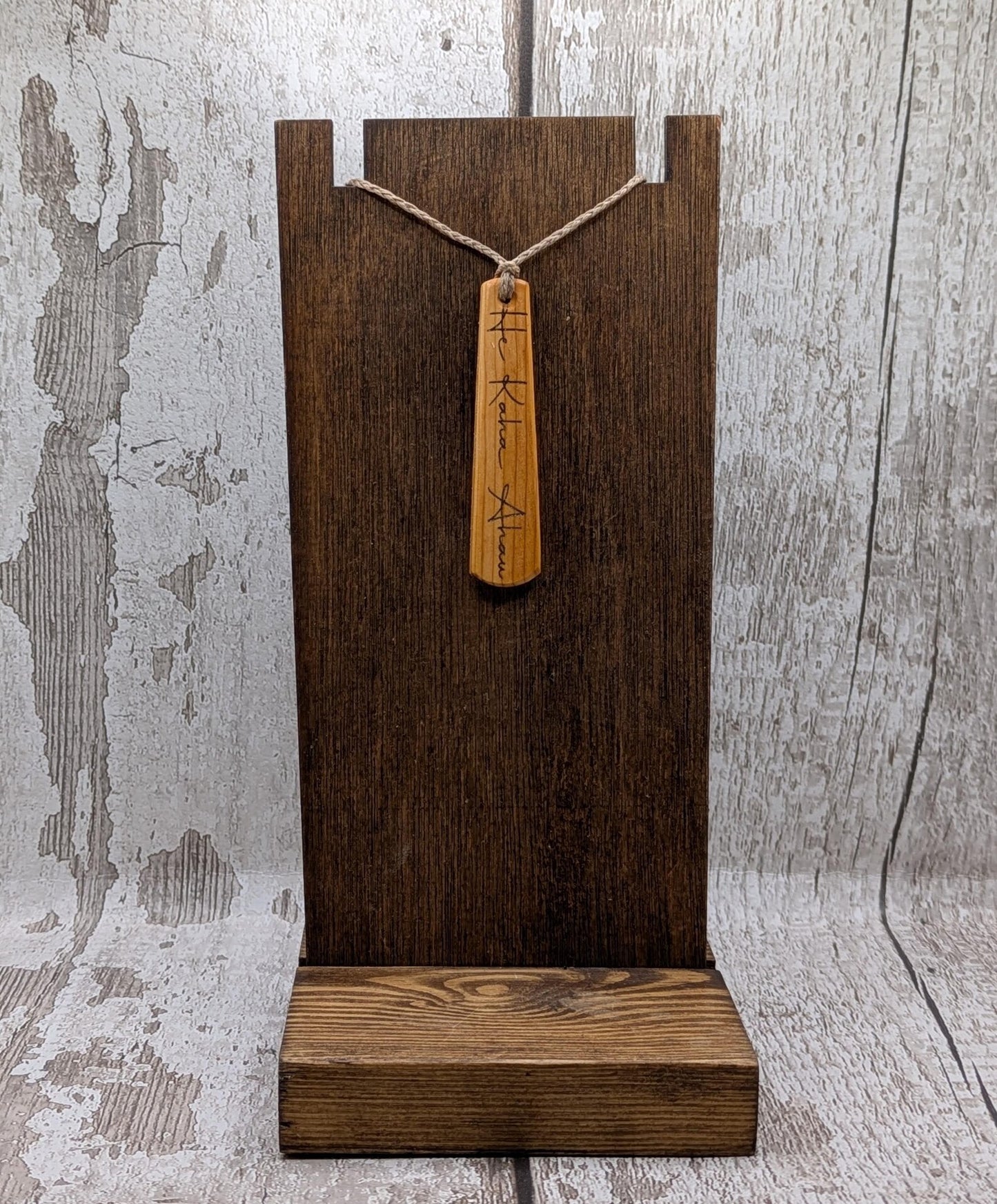Yew wood roimata drop pendant with breathe mantra laser print.