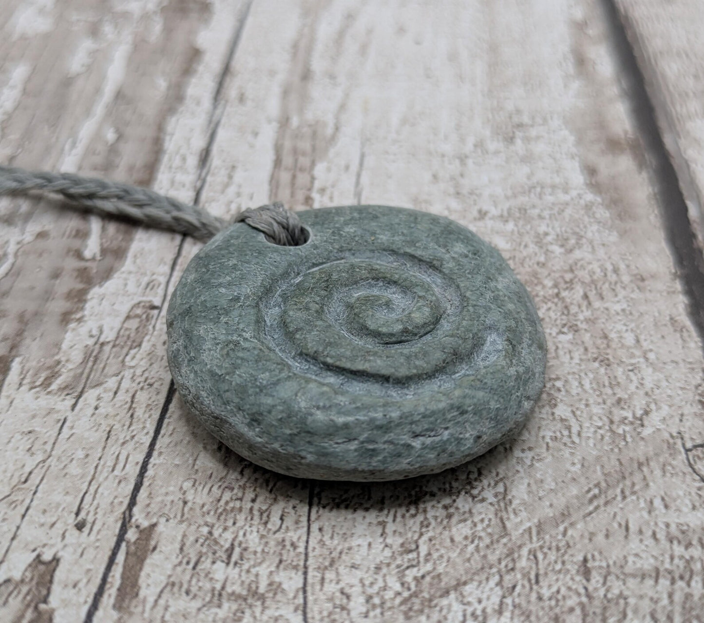 New Zealand pounamu Jade pebble pendant with Koru spiral - Raw + Polished, Handcrafted Aotearoa Necklace, Spiritual & Cultural Jewellery.
