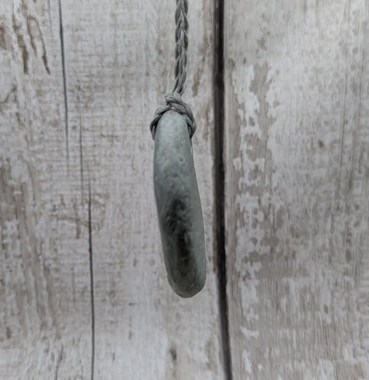 New Zealand pounamu Jade pebble pendant with Koru spiral - Raw + Polished, Handcrafted Aotearoa Necklace, Spiritual & Cultural Jewellery.
