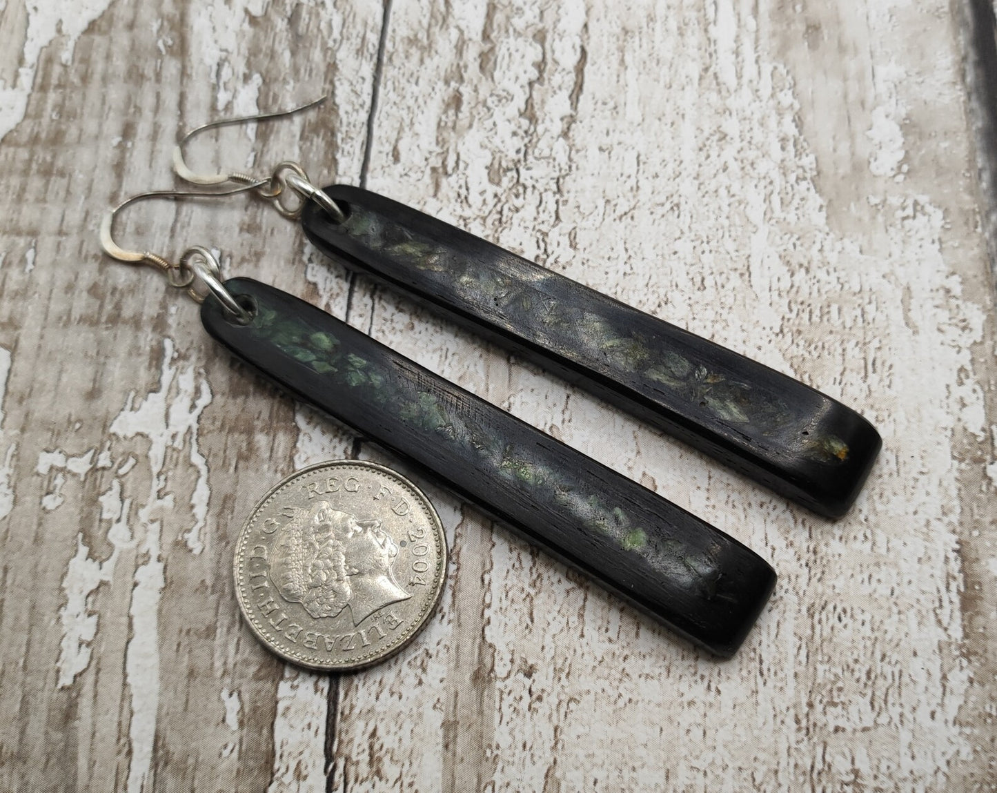 Made to order Fenland bog oak toki earrings with new Zealand pounamu greenstone inlay.