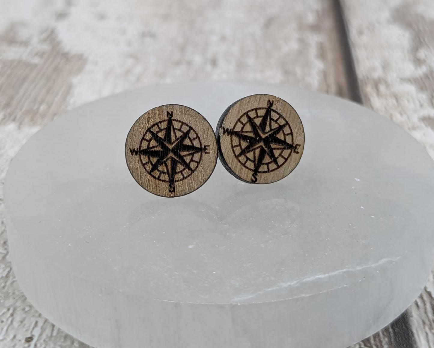 Sweet chestnut compass stud earrings with stainless steel findings.