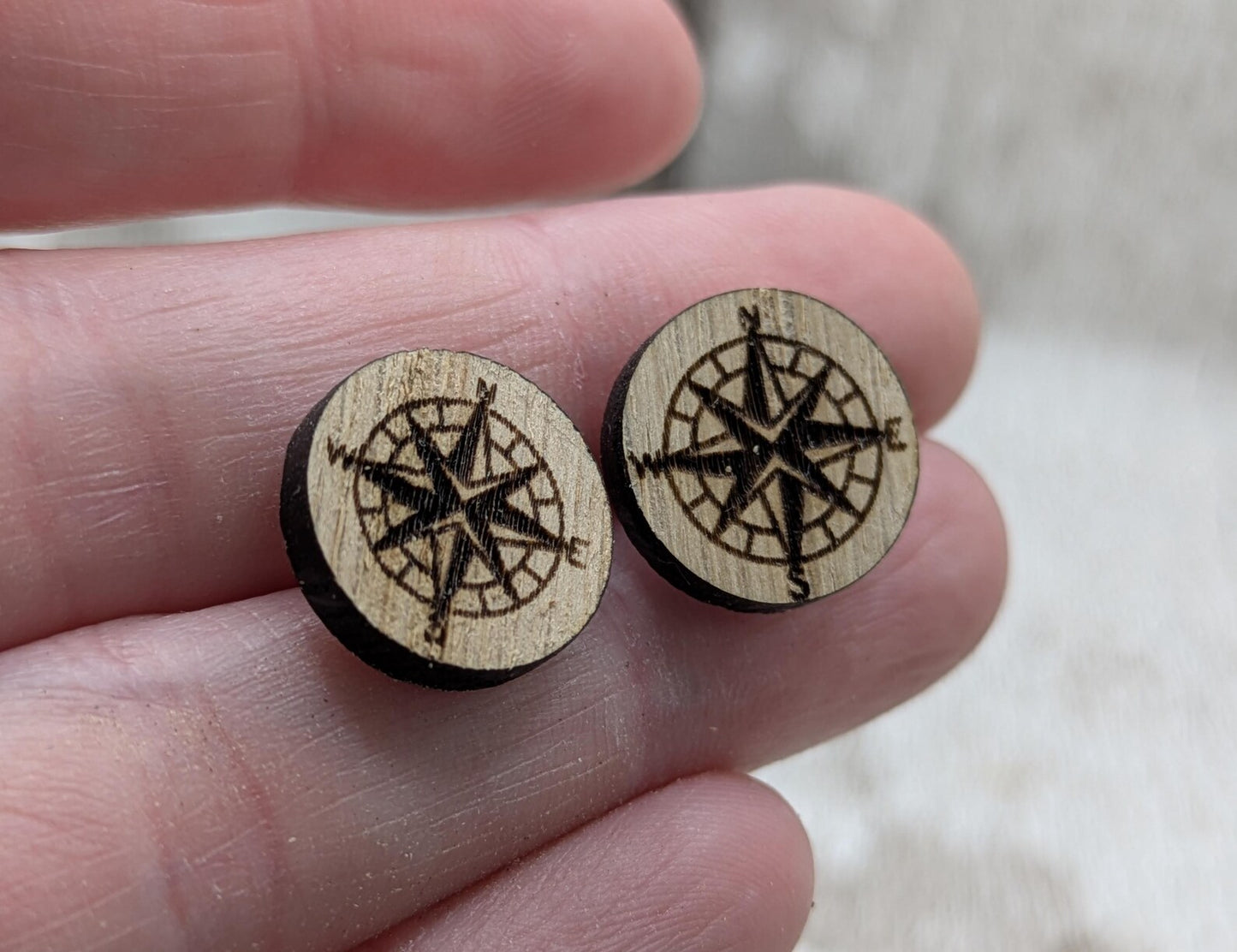 Sweet chestnut compass stud earrings with stainless steel findings.